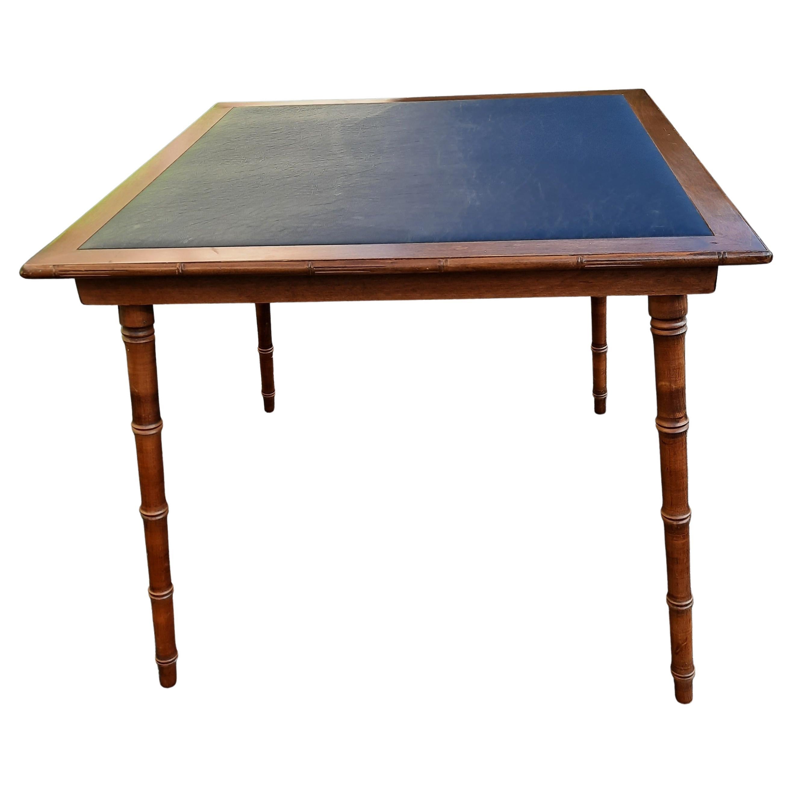 Vintage campaign style mahogany folding card table with faux leather top in very good vintage condition. Black PU leather top in very good condition. Measures 34.5