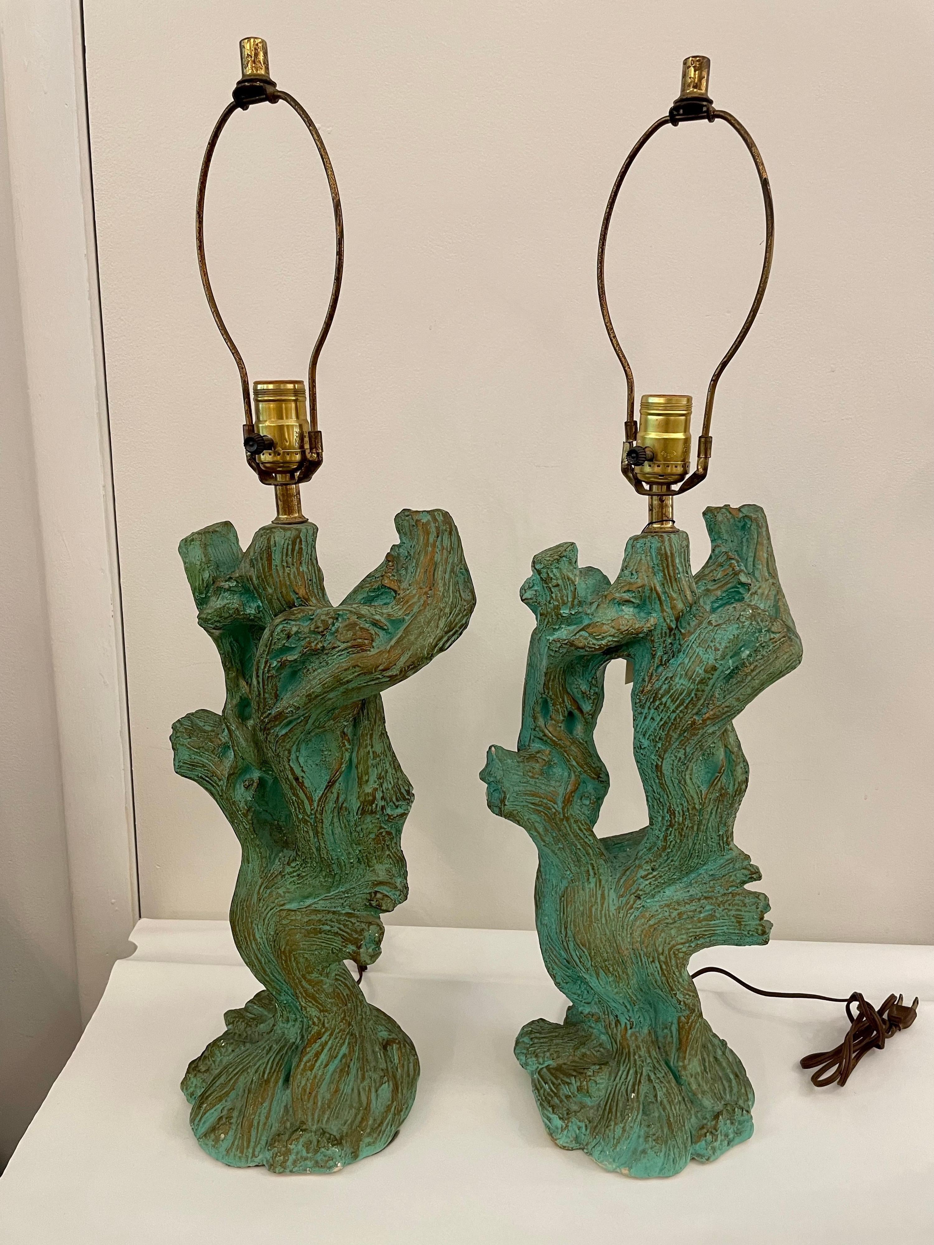 Pair of plaster faux bois driftwood bodied table lamps with beautifully authentic details. Brass stem and original socket and wiring - working well.
Note: shades not included.