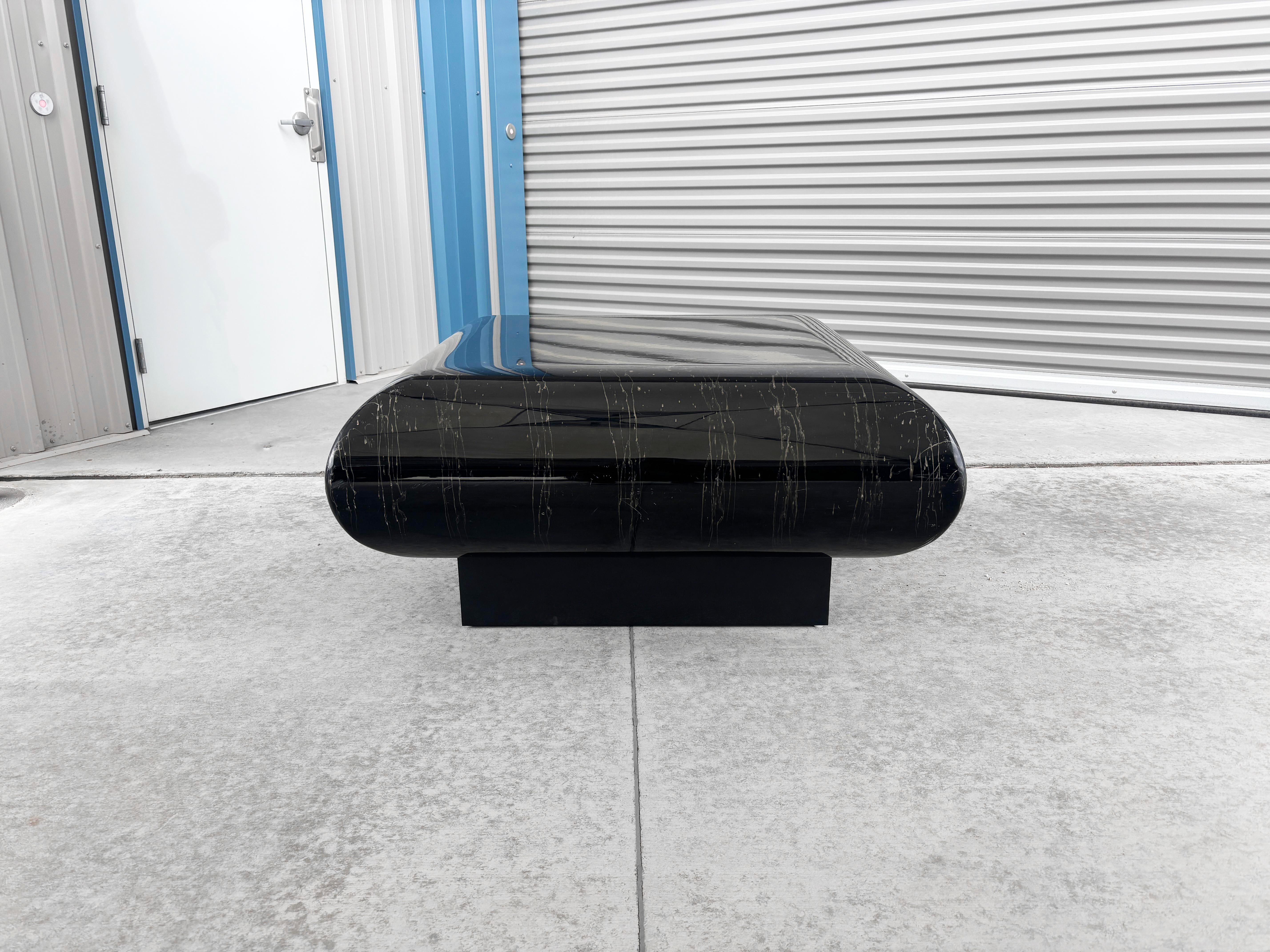 ✨ Vintage Willy Rizzo-Inspired Coffee Table ✨

Make a bold statement in your living space with this exquisite vintage coffee table, styled after the iconic Willy Rizzo design. The captivating faux marble top offers the timeless elegance of real