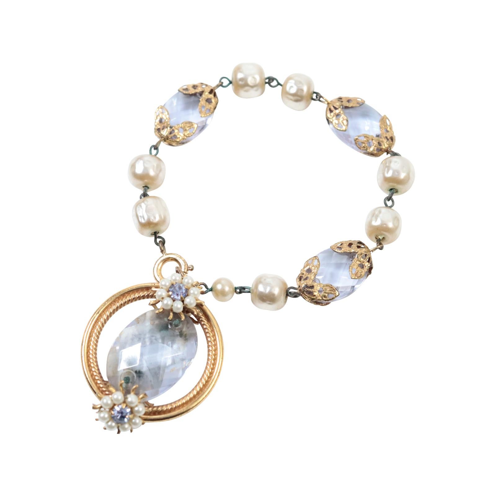 Modern Vintage Faux Pearl Dangling Bracelet  With Lavender Crystal Pieces Circa 1960s For Sale