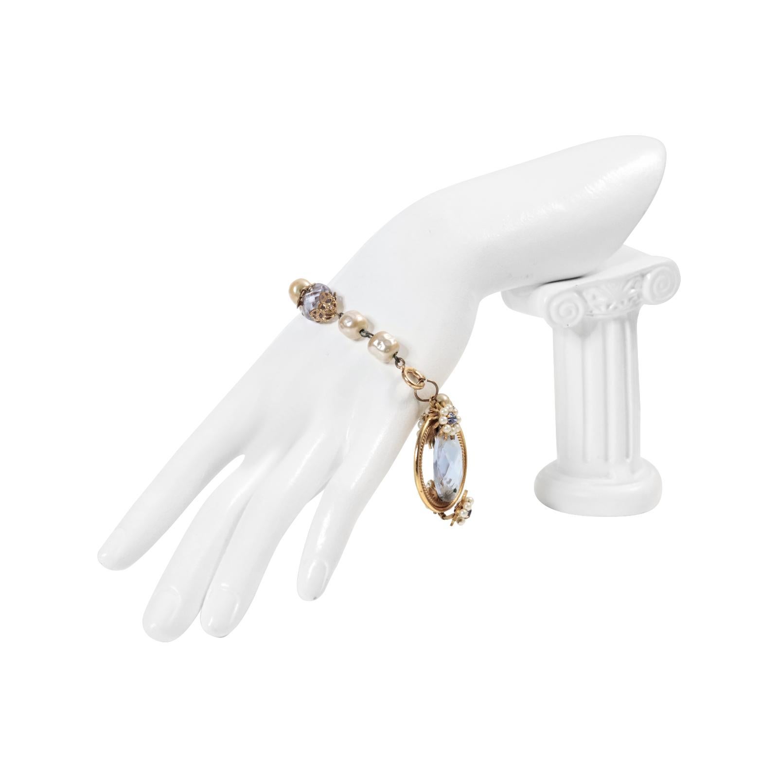 Vintage Faux Pearl Dangling Bracelet  With Lavender Crystal Pieces Circa 1960s In Good Condition For Sale In New York, NY