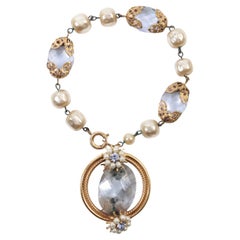 Bracciale con perle finte vintage  Con pezzi di cristallo color lavanda Circa 1960