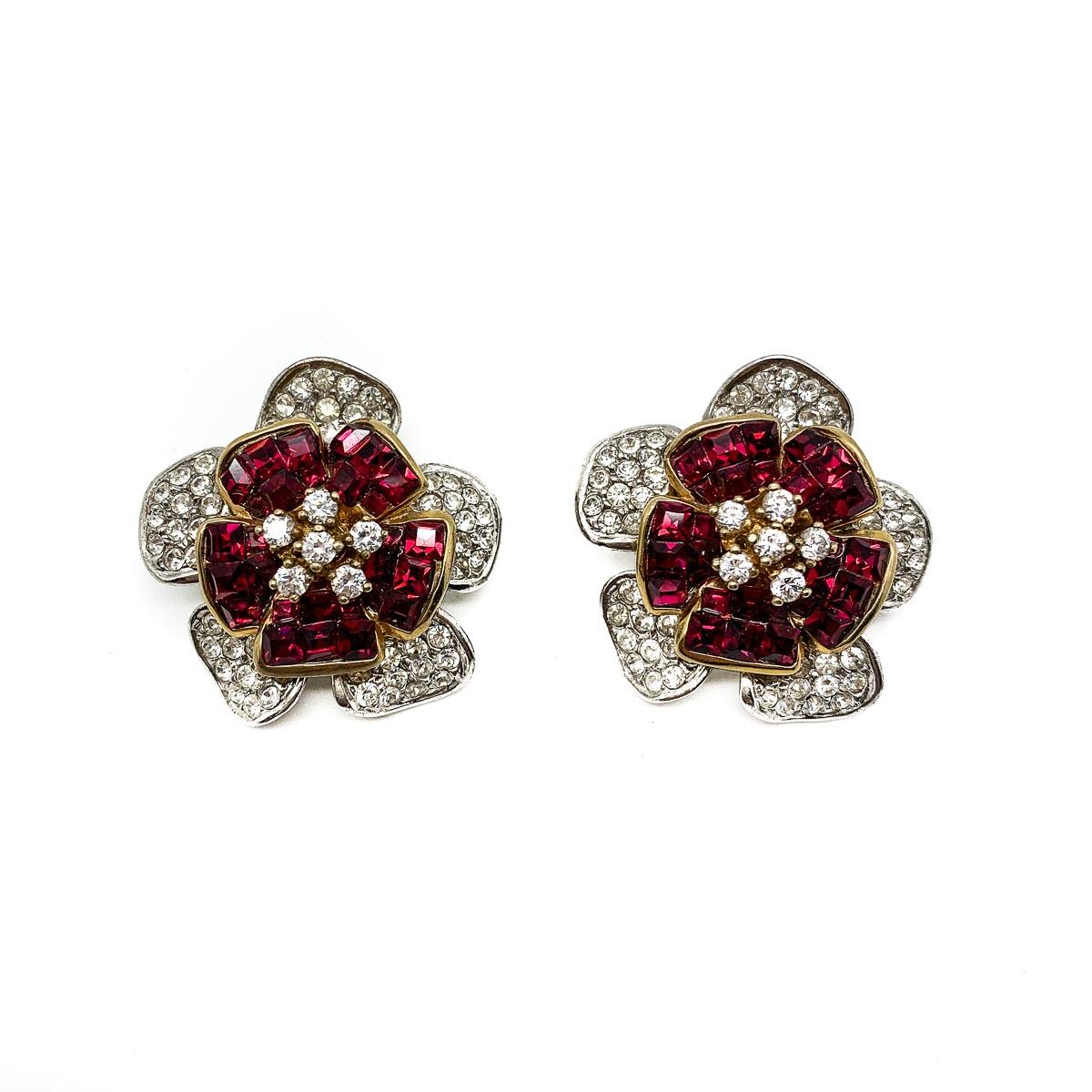 Vintage Ruby Crystal Flower Earrings. Stunning craftsmanship. Created in solid sterling silver and set with 'invisibly set' ruby and white crystals in a captivating floral design. Exceptional quality and attention to detail. Very good condition.