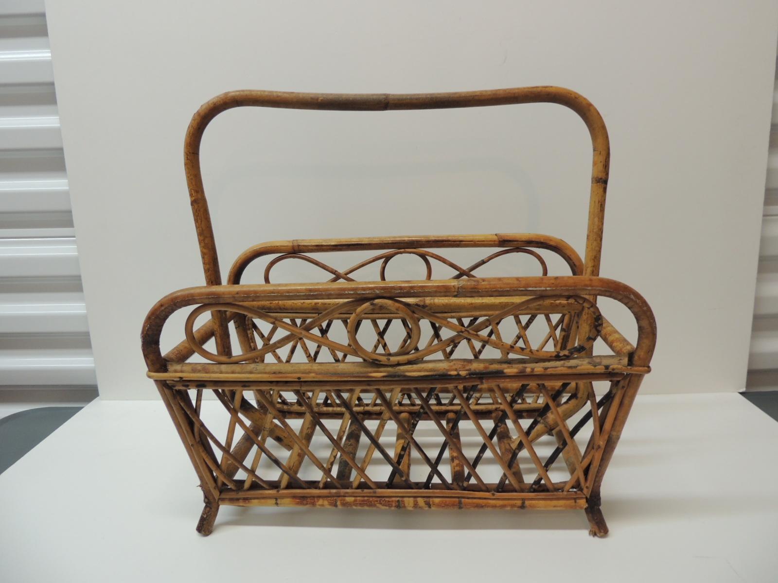 Vintage faux tortoise magazine rack in bamboo and rattan
With trellis pattern and bent wicker details
Size: 17