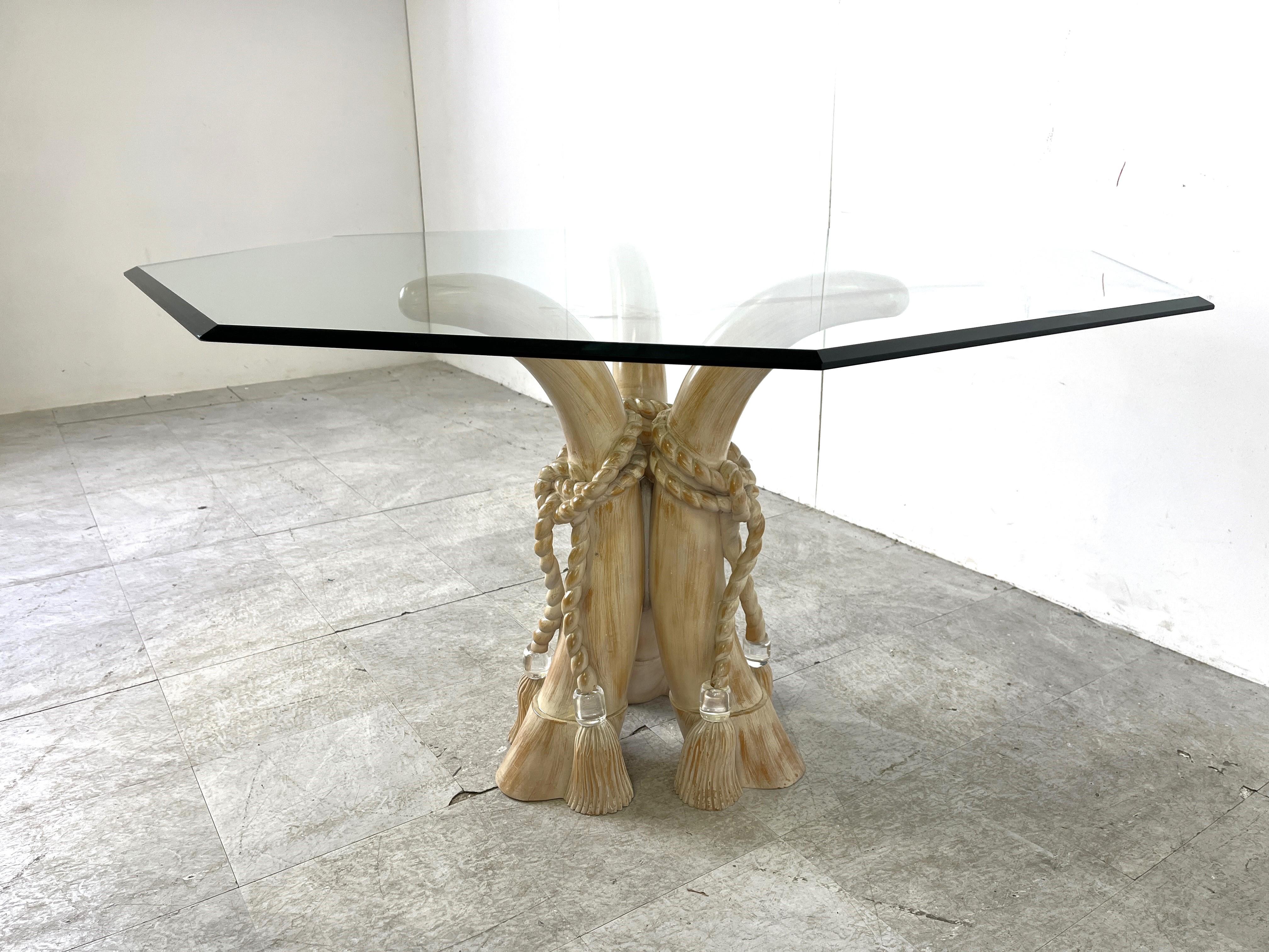Striking vintage faux tusk dining table made from resin and wood with lucite and a beveled octogonal glass table top.

Nicely detailed tusks and cords.

Eye catching dining table in very good condition

1970s - Italy

Height: 75cm/29.52