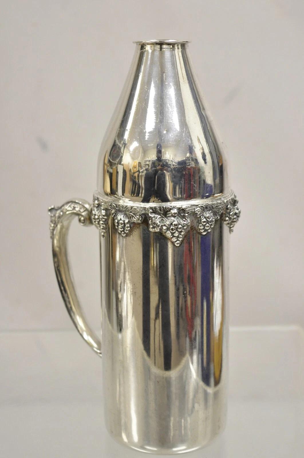 Vintage FB Rogers Victorian Silver Plated Grapevine Weinflaschenhalter w / Handle. Circa Mitte des 20. Jahrhunderts. Abmessungen: 11