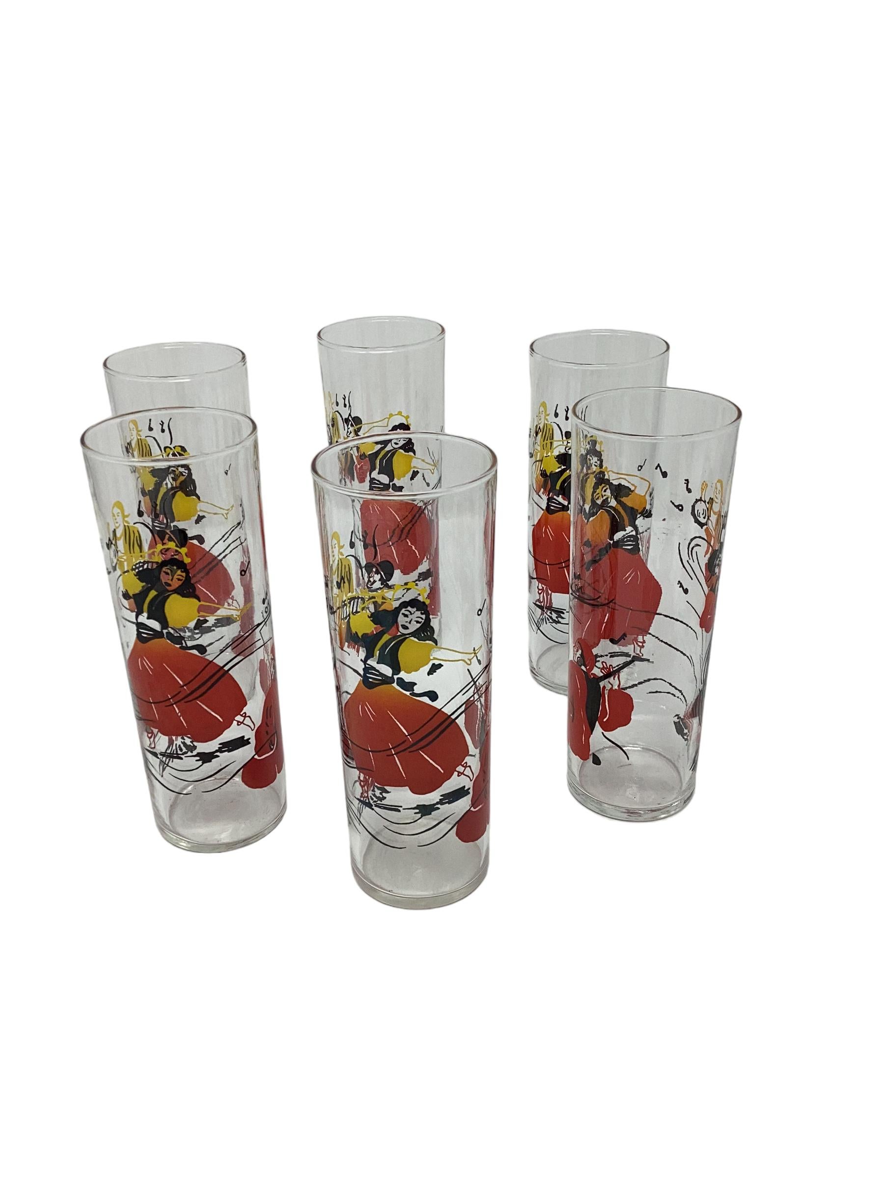 Set of 6 Vintage Federal Glass Tom Collins Flamenco Dancer Glasses. Each glass decorated with a female flamenco dancer dressed in brightly colored red, yellow and orange outfit while a guitar player plays in front of an open fire.