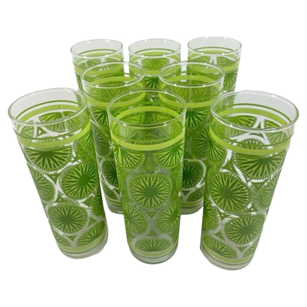 Vasos Tom Collins Vintage Federal Glass con rodajas de lima con textura de azúcar levantada