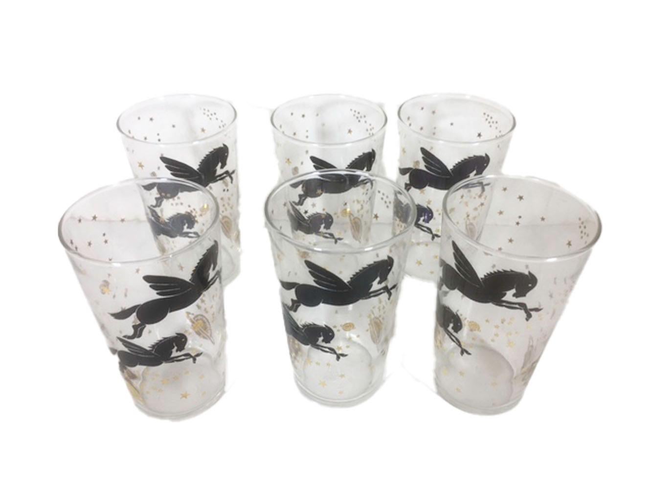 Set of 6, mid 20th century tumblers with images of the mythical winged horse Pegasus in black enamel among 22k gold stars and planets.