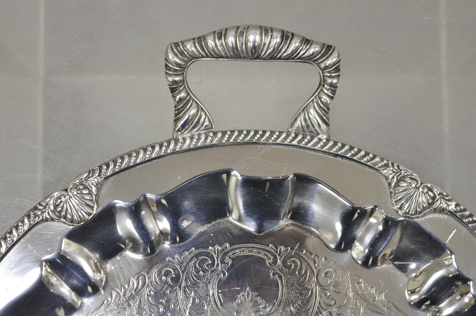 round silver serving tray with handles