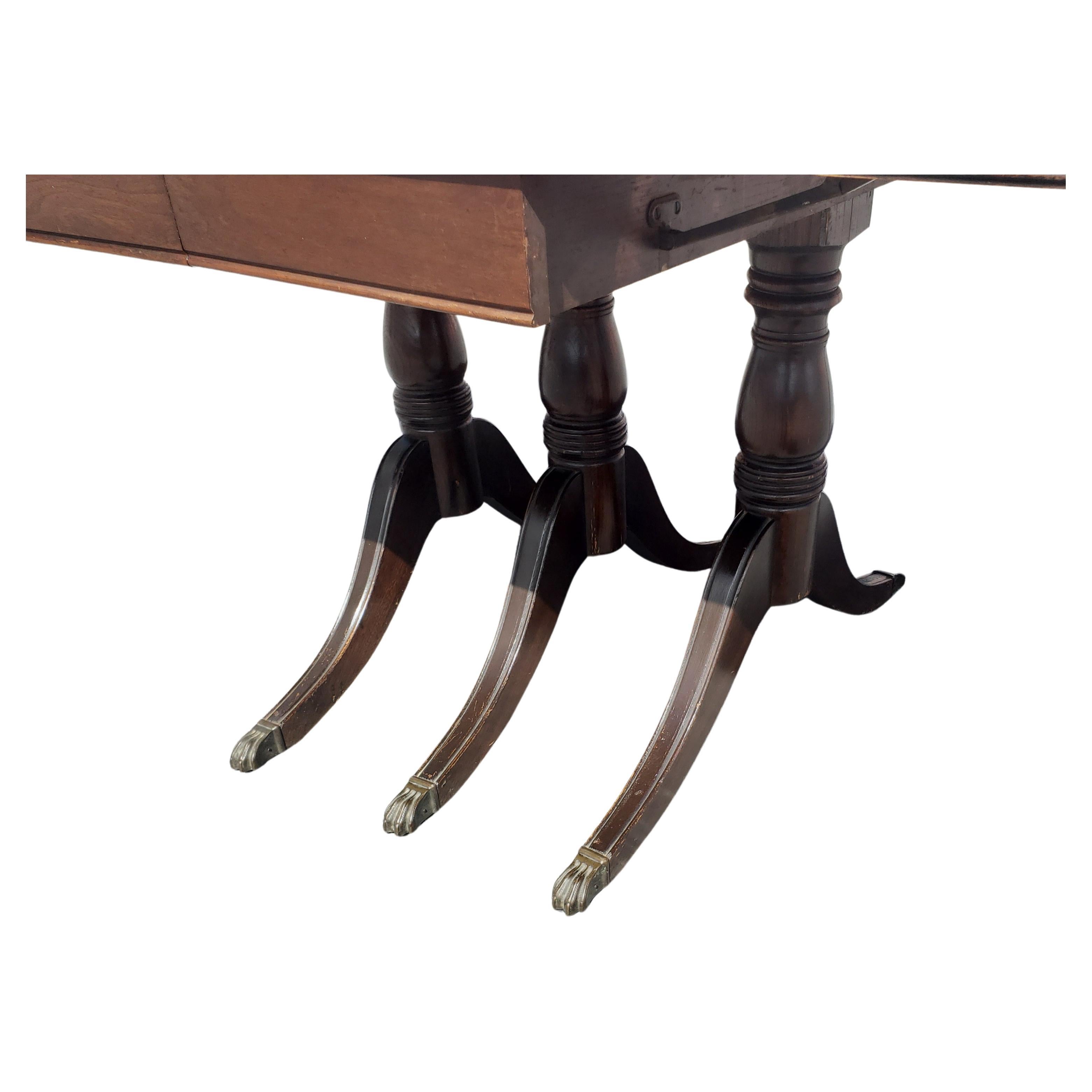 Hand-Crafted Vintage Federal Style Triple Pedestal Drop-Leaf Dining Table, circa 1940s For Sale