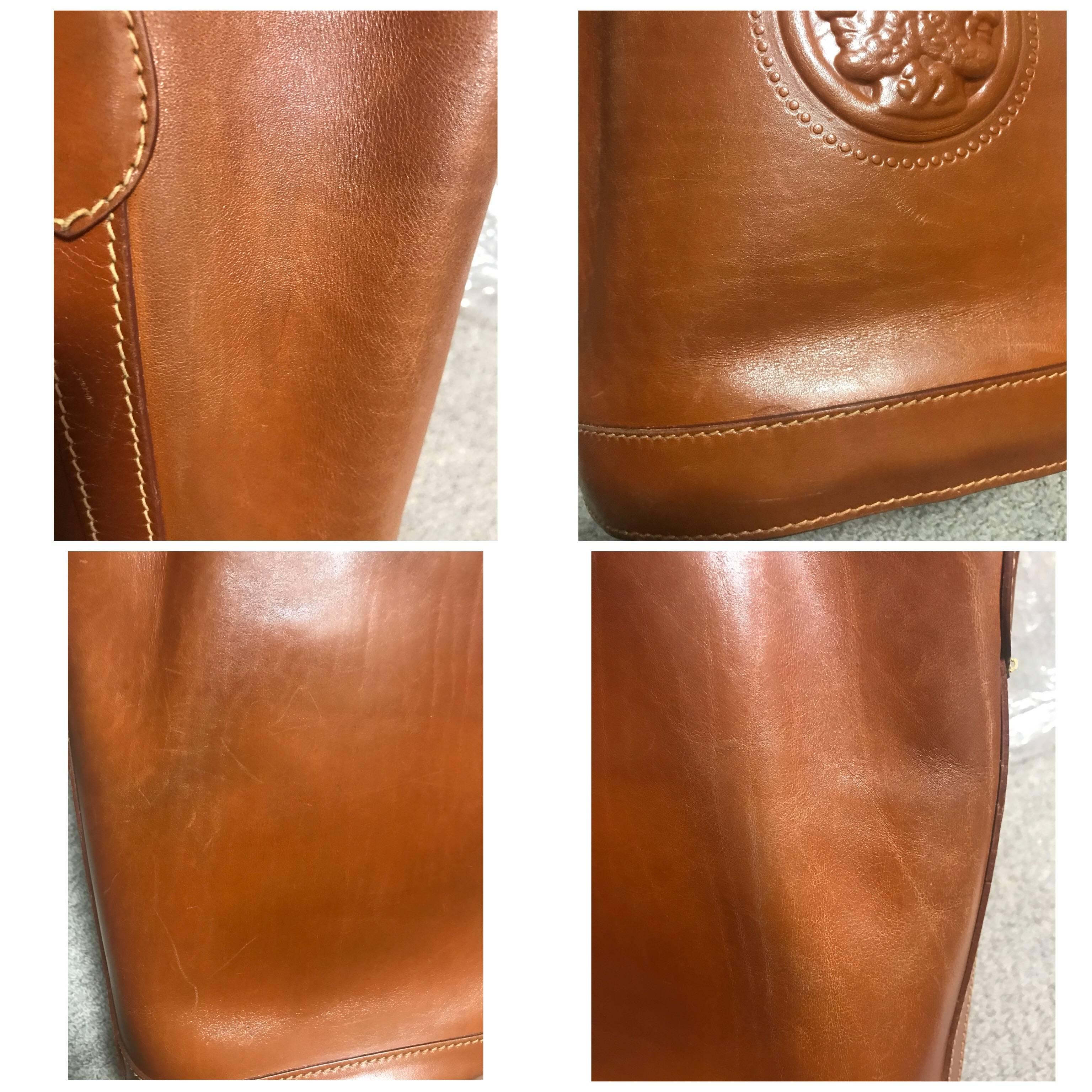 Women's or Men's Vintage FENDI brown leather hobo bucket, shoulder bag with drawstring and Janus.