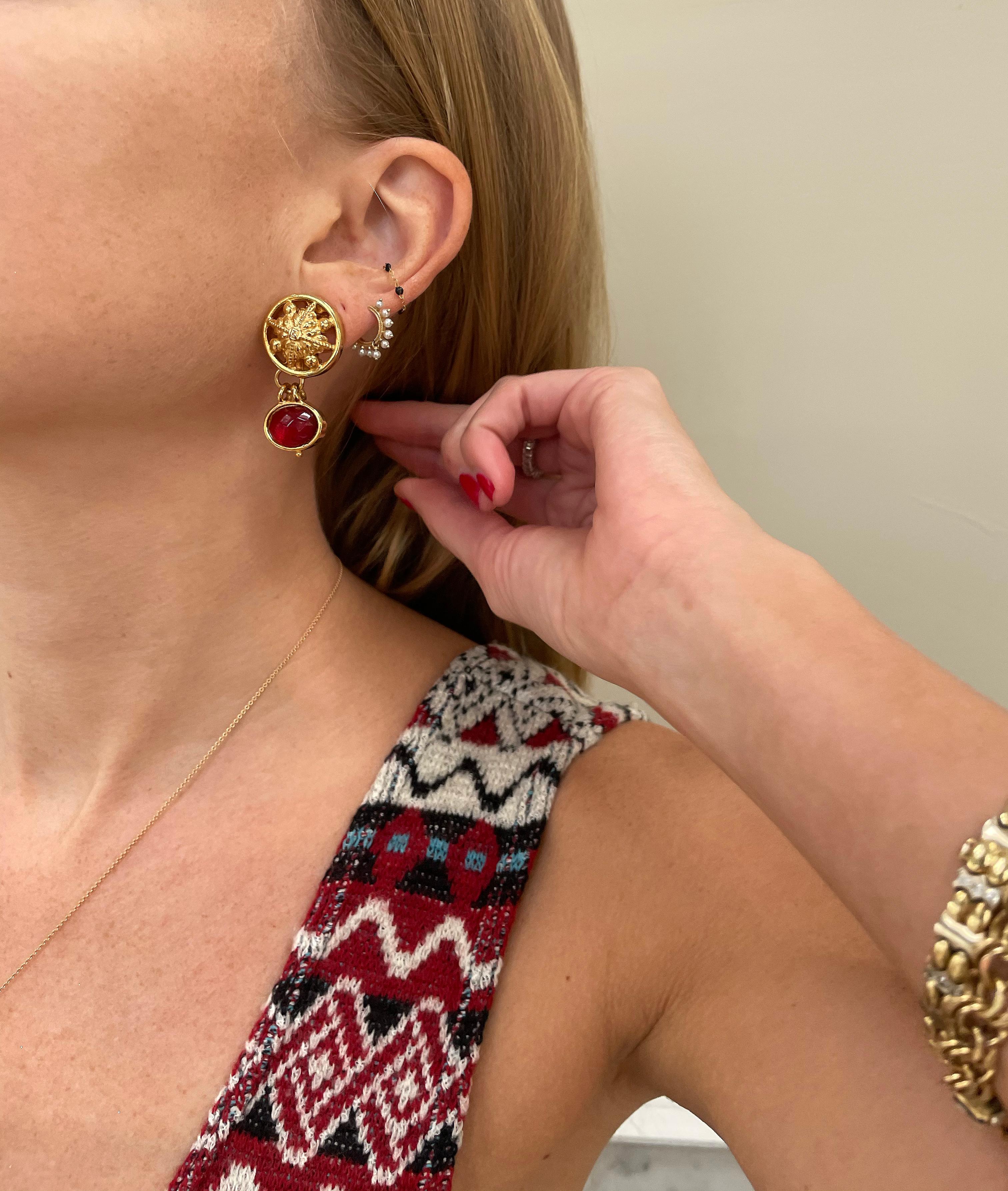 Vintage Fendi Drop Earrings: These earrings  are super rare— it's not so easy to come by Fendi jewelry from this era, and this pair is especially unique. Made in the 1980s, features an ornate gold medallion with the house's signature FF logo, and a