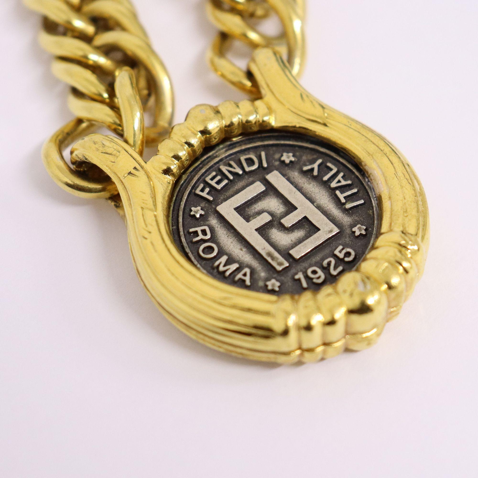 Vintage Fendi Gold Plated Coin Pendant Chain Necklace.
Circa 1980's.
Coin pendant features Roman God Janus looking to the past and future with 