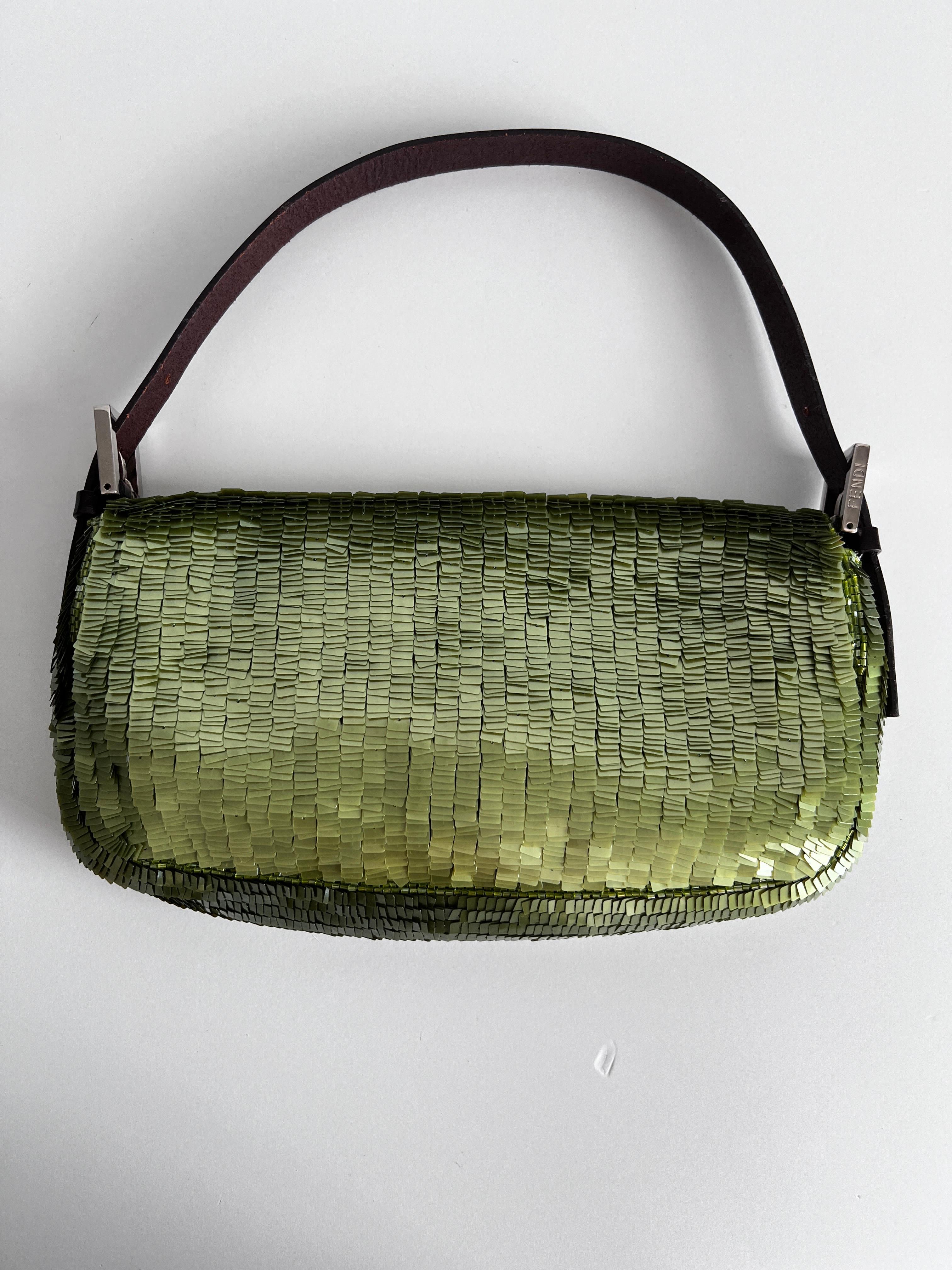 Vintage green sequin baguette
It is very rare; it is probably the only one you can find on the market.
Very good condition
NO sequin missing
NO pulling and peeling
Clean interior
No noticeable stains or flaws 
