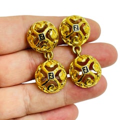 Vintage FENDI logo signed gold designer runway dangle clip on earrings