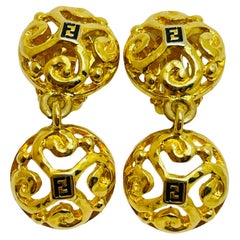 Used FENDI logo signed gold designer runway dangle clip on earrings 