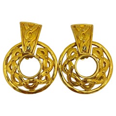 Used FENDI logo signed gold designer runway door knocker earrings 