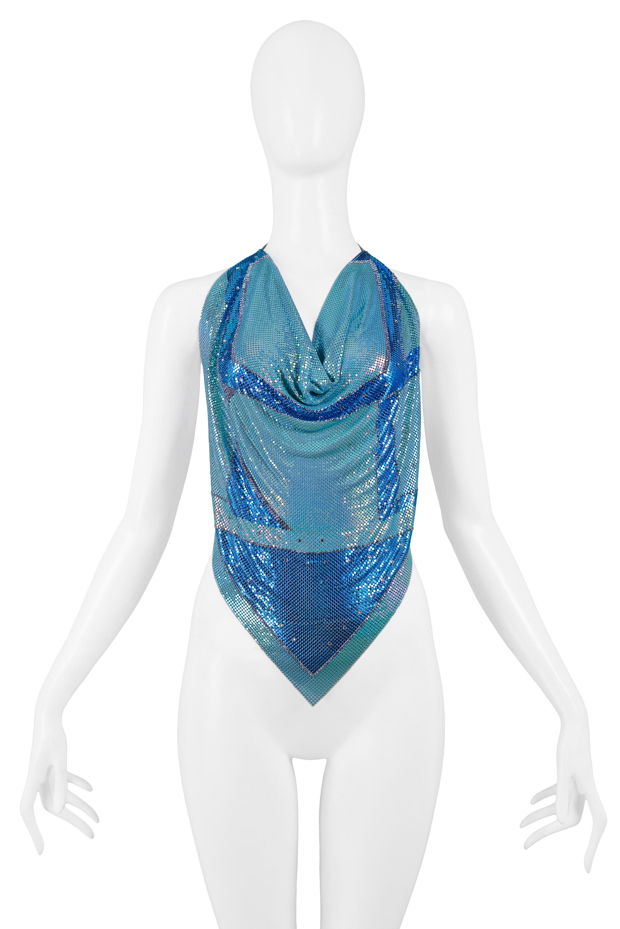 Resurrection Vintage is excited to offer a vintage Anthony Ferrara handmade turquoise and blue chainmail metal halter top with leather straps, rhinestones, and diamond front hem. The cowl neckline is adjustable and can be worn low or high. Circa