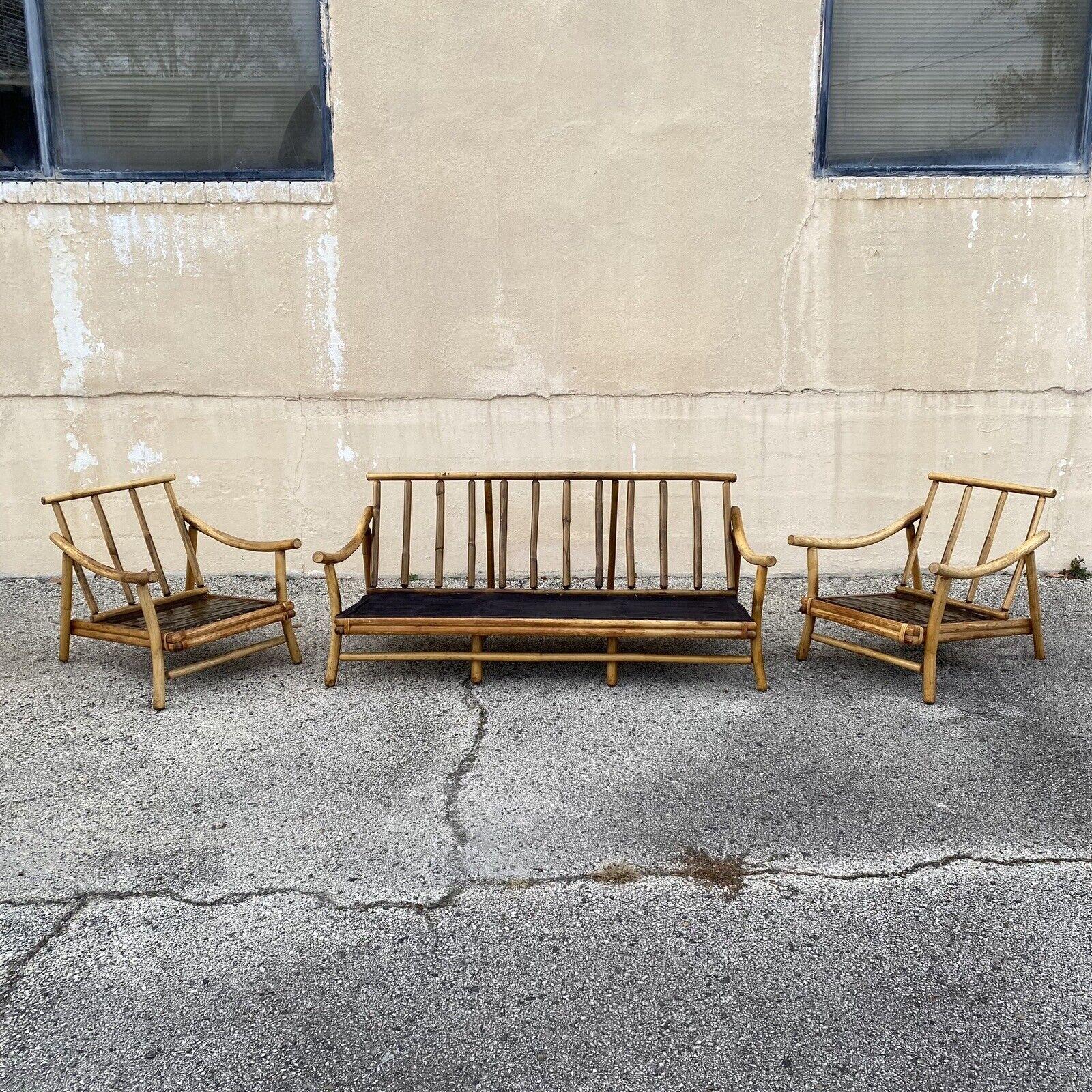 Vintage Ficks Reed Bamboo Rattan Tiki Sofa Set with Pair of Lounge Chairs, Unmarked - 3 Pc Set. Circa Mid 20th Century.
Measurements: 
Sofa: 27