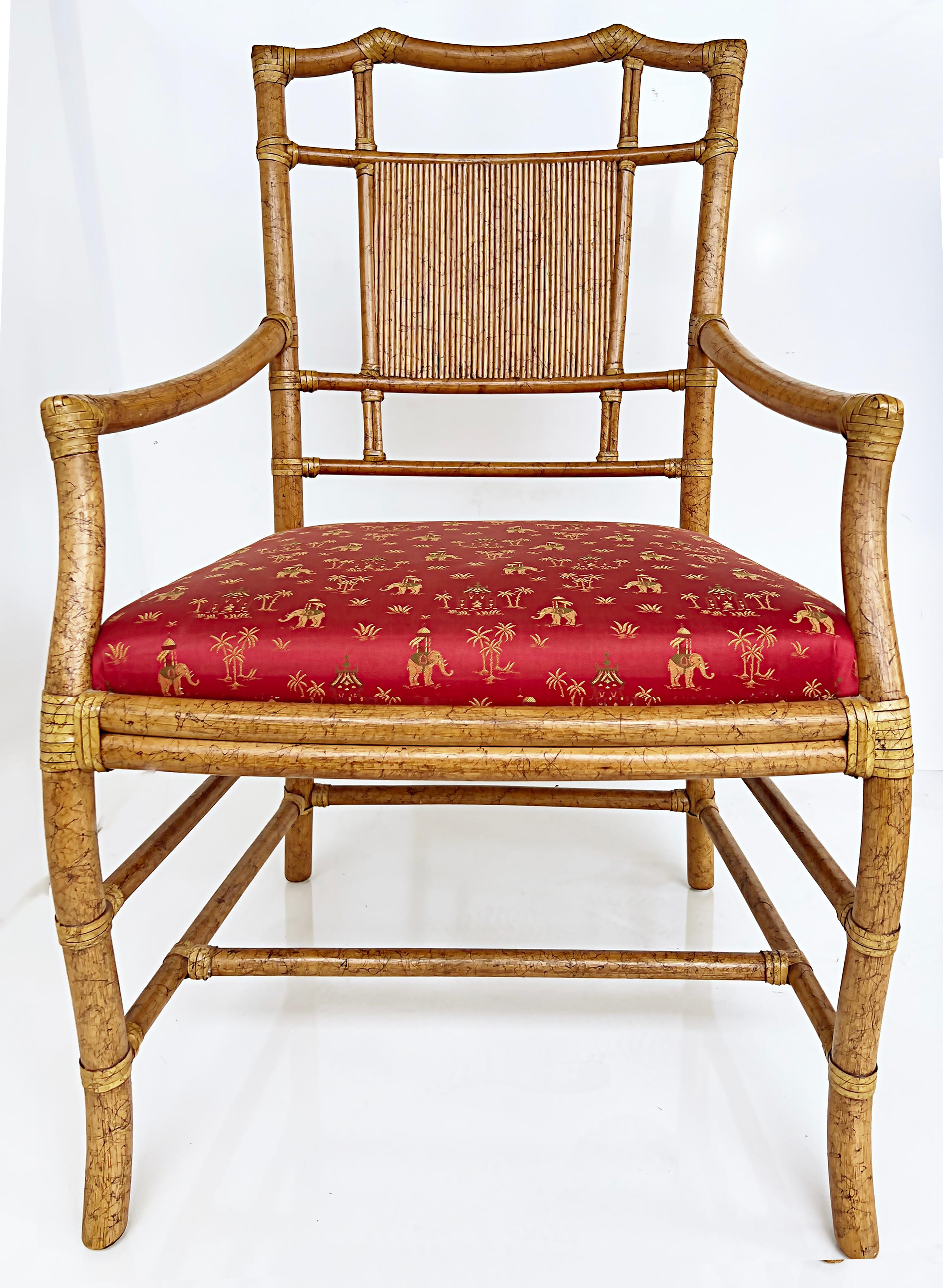 Offered for sale is a set of 6 vintage Chinoiserie rattan dining chairs by Ficks Reed. The set includes 2 armchairs and 4 side chairs. The chairs are in extremely good condition and have a faux-tortoise finish with rawhide leather wrapping accents.