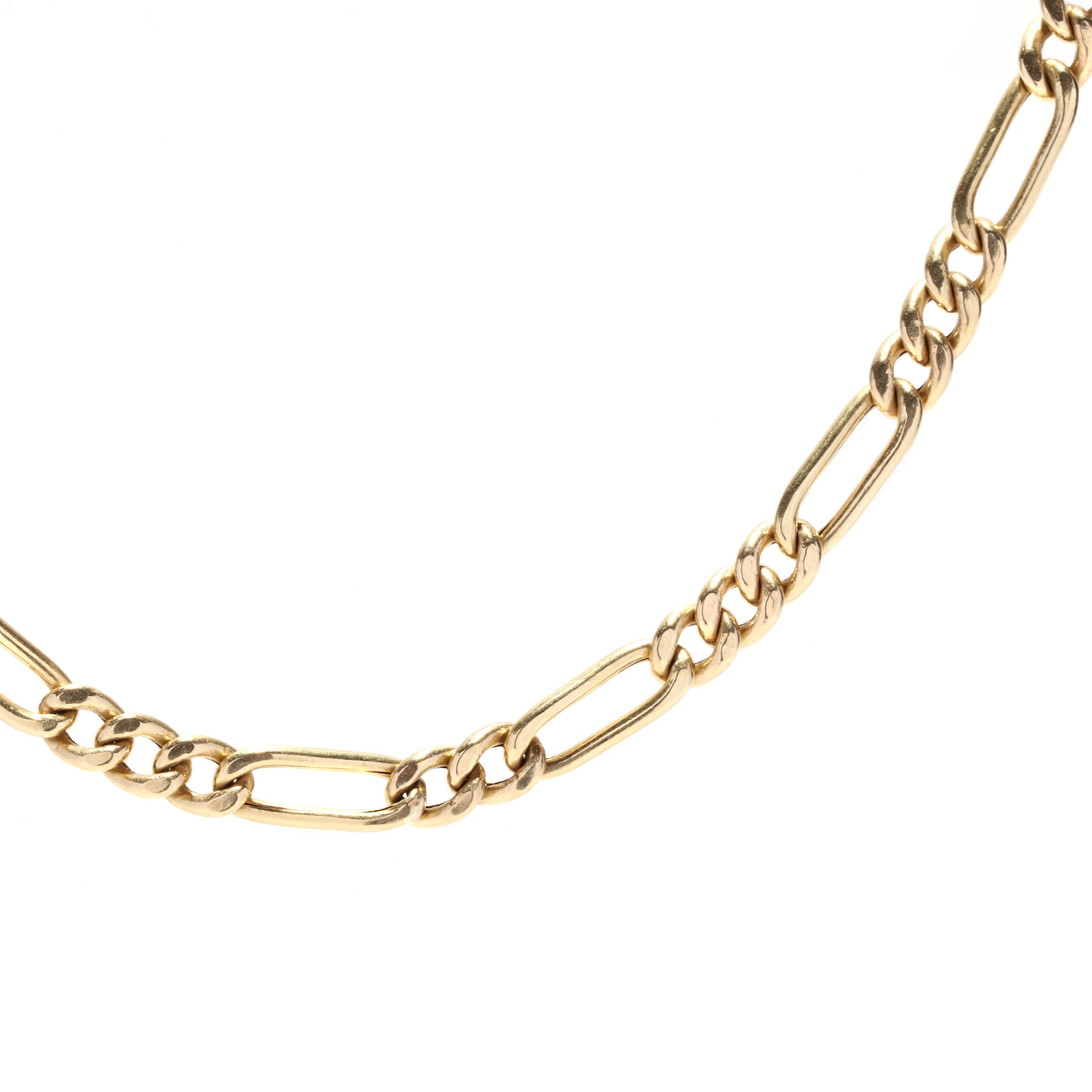 A vintage 18 karat yellow gold figaro chain necklace. This chain features an alternating design of long oval curb links and three short curb links to create the figaro design and is finished with a lobster clasp.

Length: 24.5 in. 

Width: 4.85