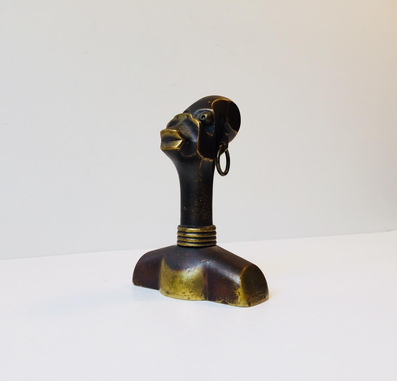 Rare decorative novelty Bar item. Its made of forced patinated bronze and features a concealed bottle opener and corkscrew. It is imprinted Barberto, Lisboa and was manufactured during the 1970s in Portugal. The style of this piece is very