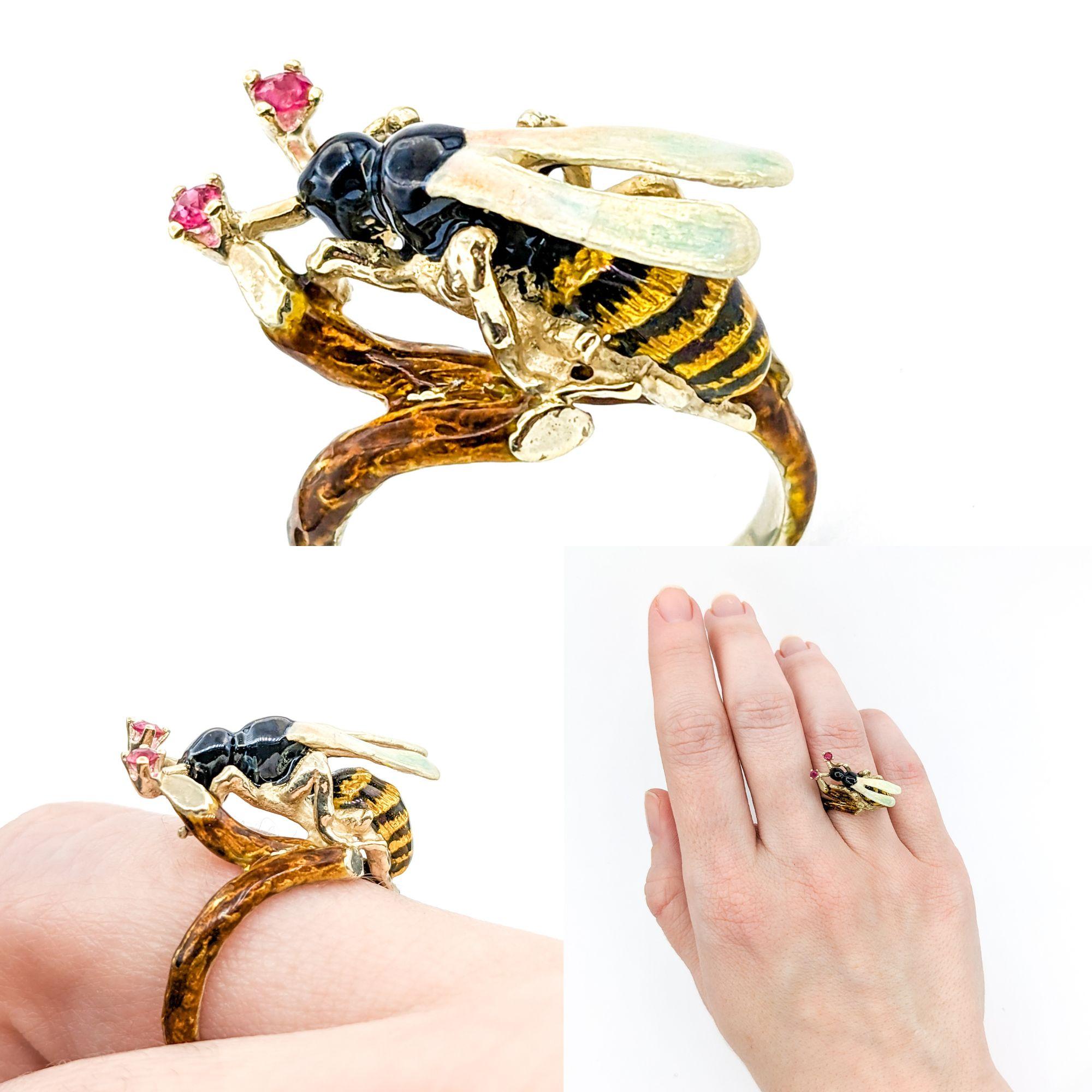 Vintage Figural Enamel Wasp Insect Ring with Rubies In Yellow Gold

Embrace the charm of this truly unique insect ring, meticulously crafted in 14k yellow gold. This ring features a delightful and realistic Wasp design with rich enamel colors and