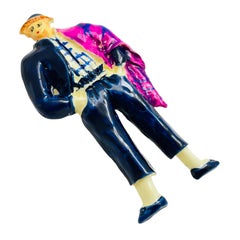 Vintage figural fashion plastic designer brooch