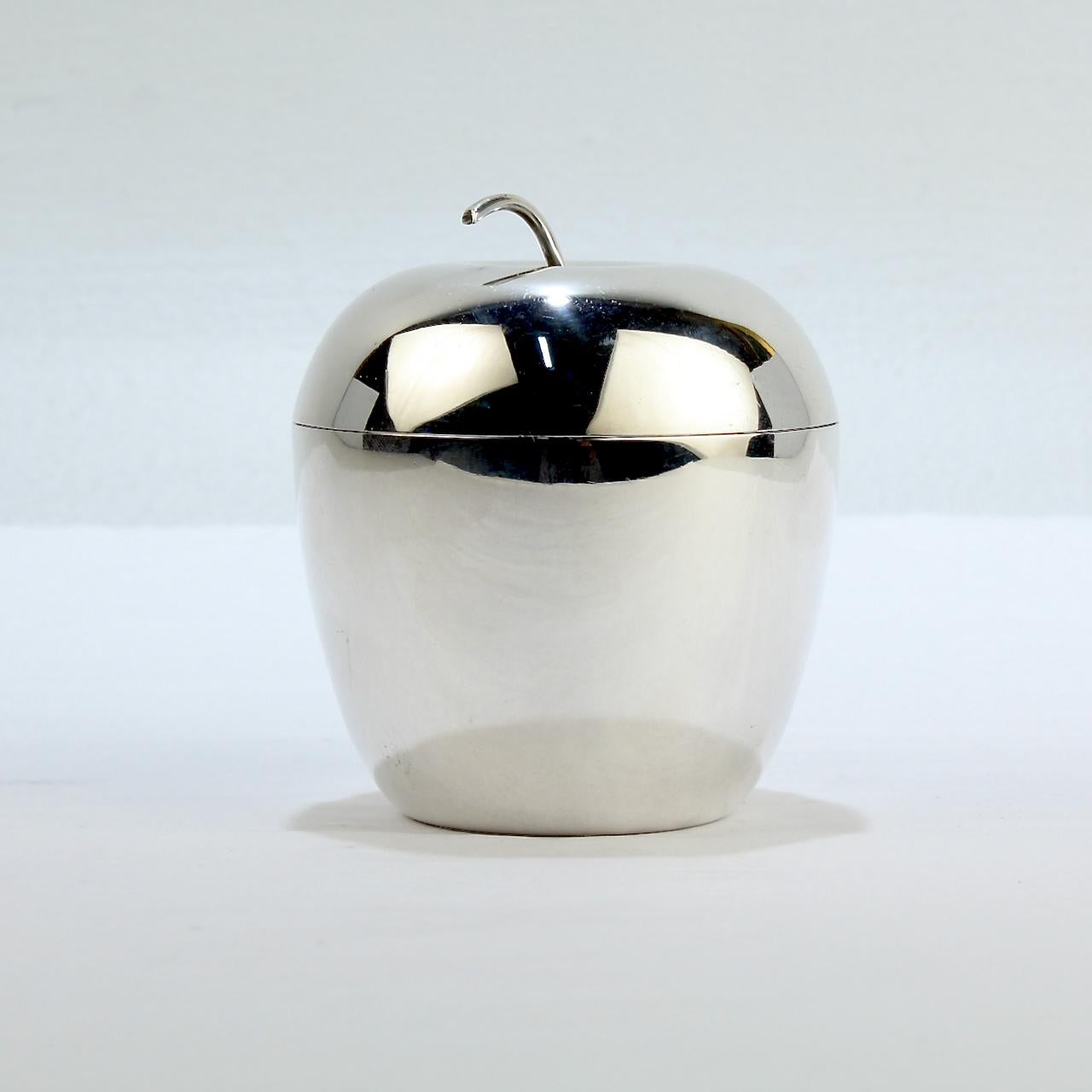 A terrific apple shaped covered box.

In sterling silver and marked for J. E. Caldwell.

A wonderful vintage box with great design!

Date:
20th Century

Overall Condition:
It is in overall good, as-pictured, used estate condition with some fine &
