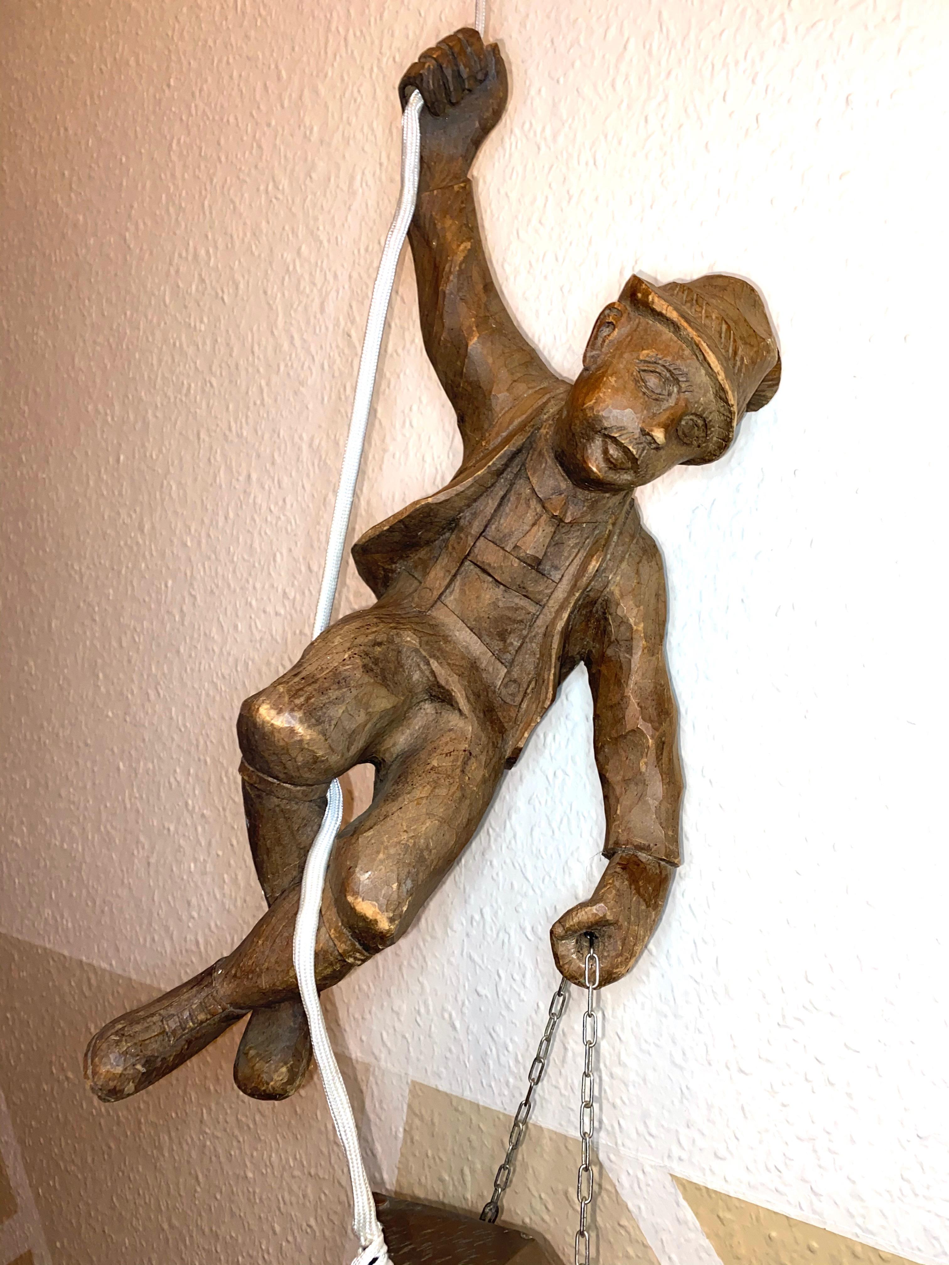 German Vintage figural Pendant Lamp a Mountain Climber & Lantern in Black Forest Style For Sale