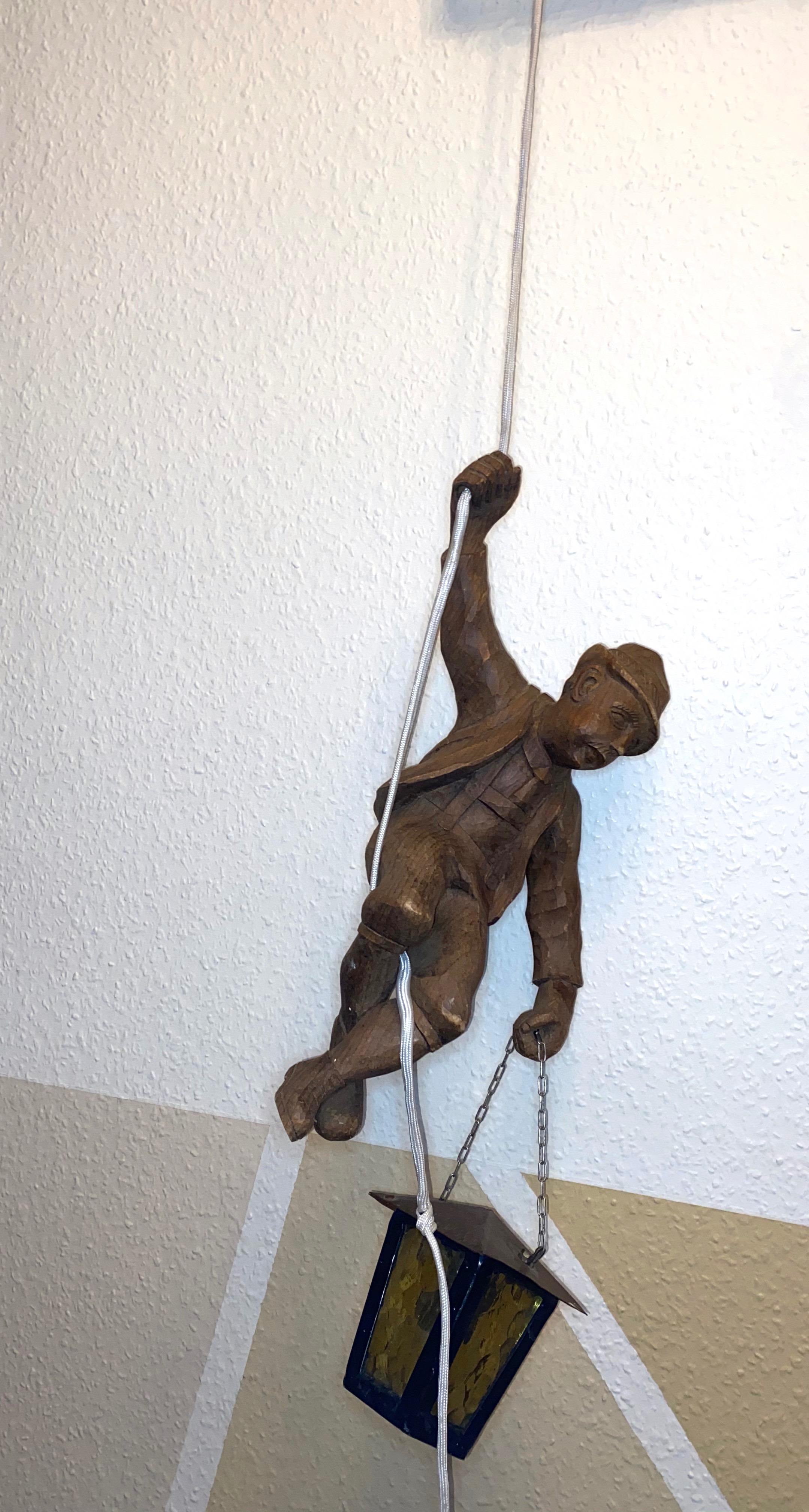 Vintage figural Pendant Lamp a Mountain Climber & Lantern in Black Forest Style For Sale 1