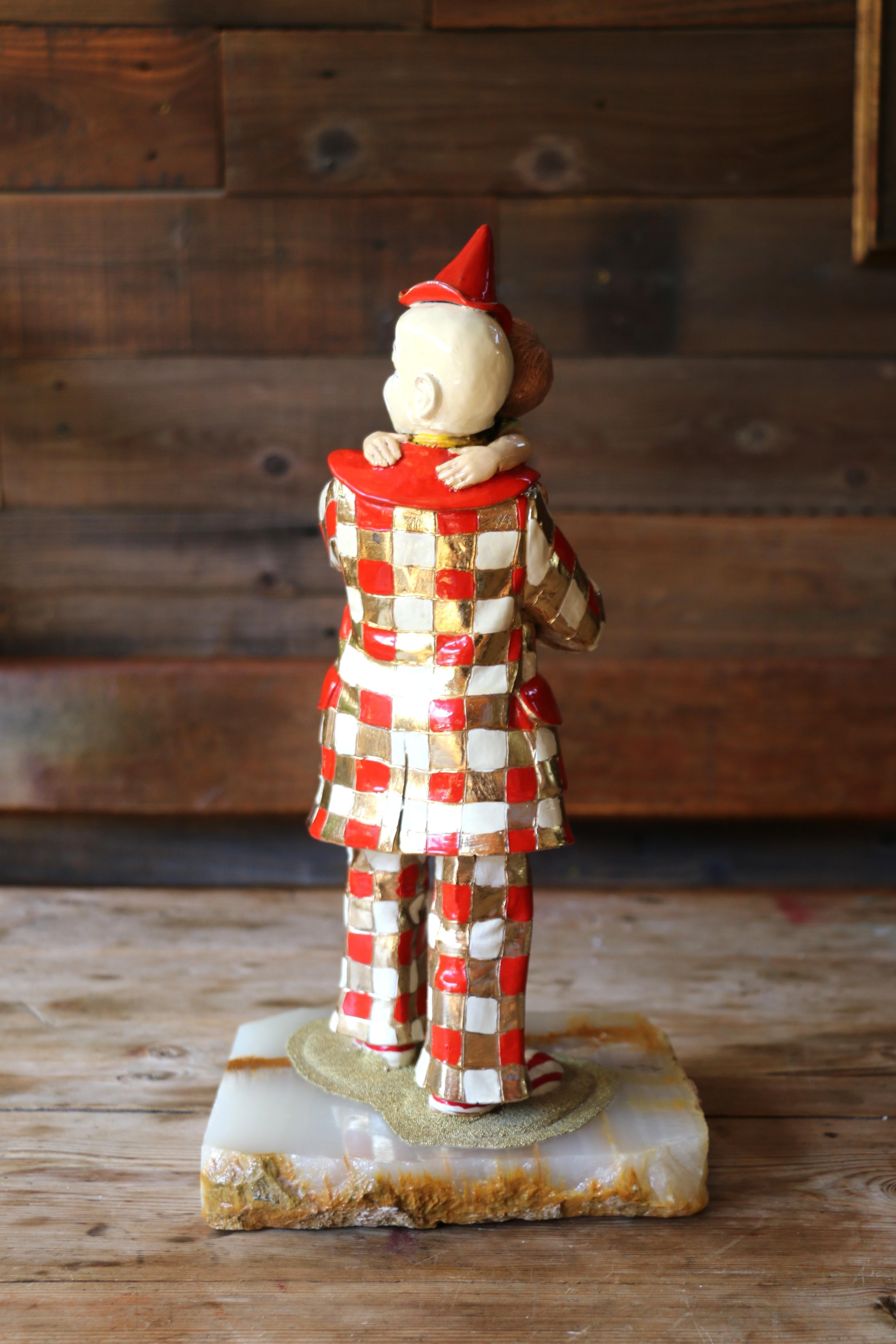 Americano Vintage Figurine a Child Embracing a Clown by Ron Lee, 1985 in vendita