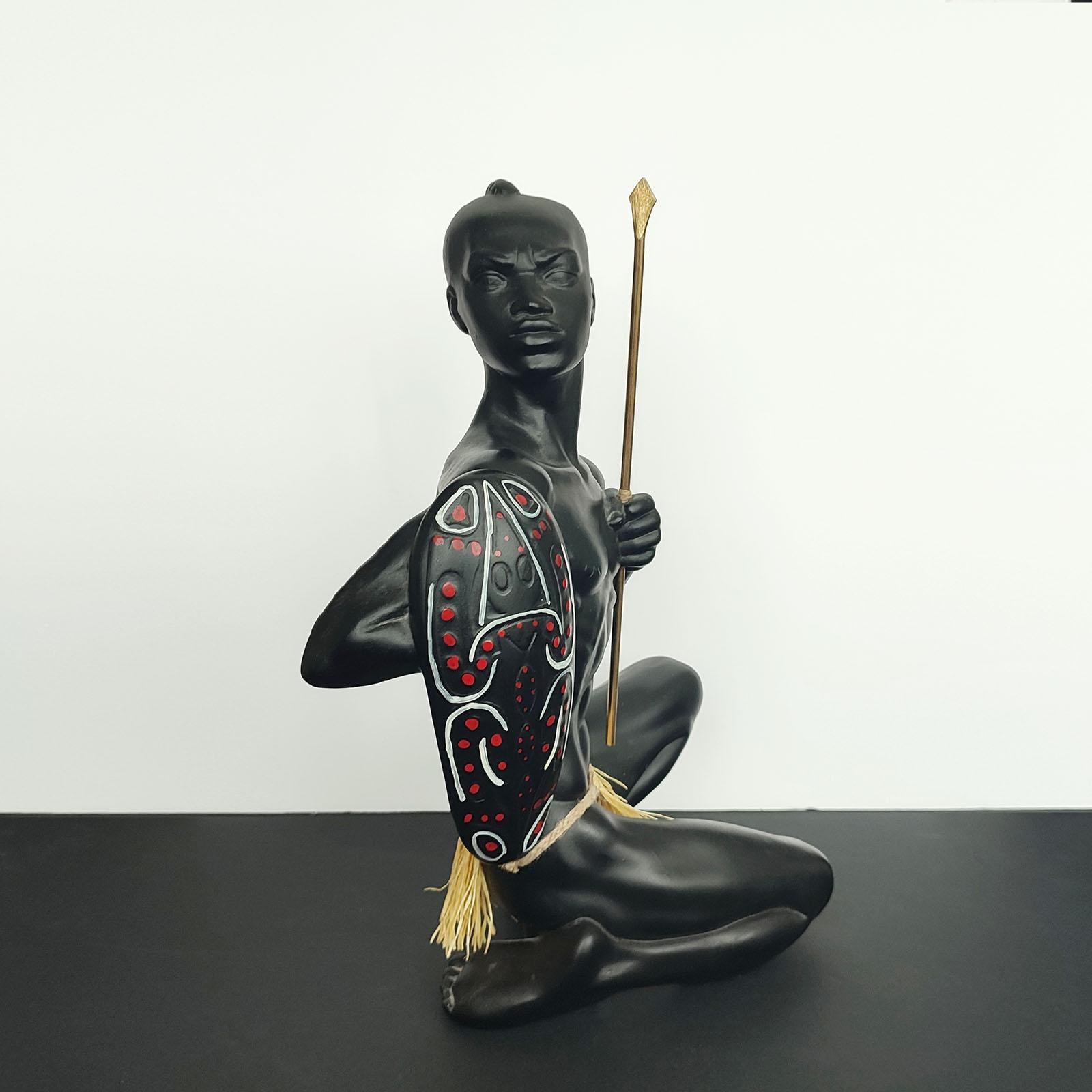 Hand-Crafted Vintage Figurine of an African Warrior with Spear and Shield For Sale