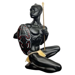 Vintage Figurine of an African Warrior with Spear and Shield