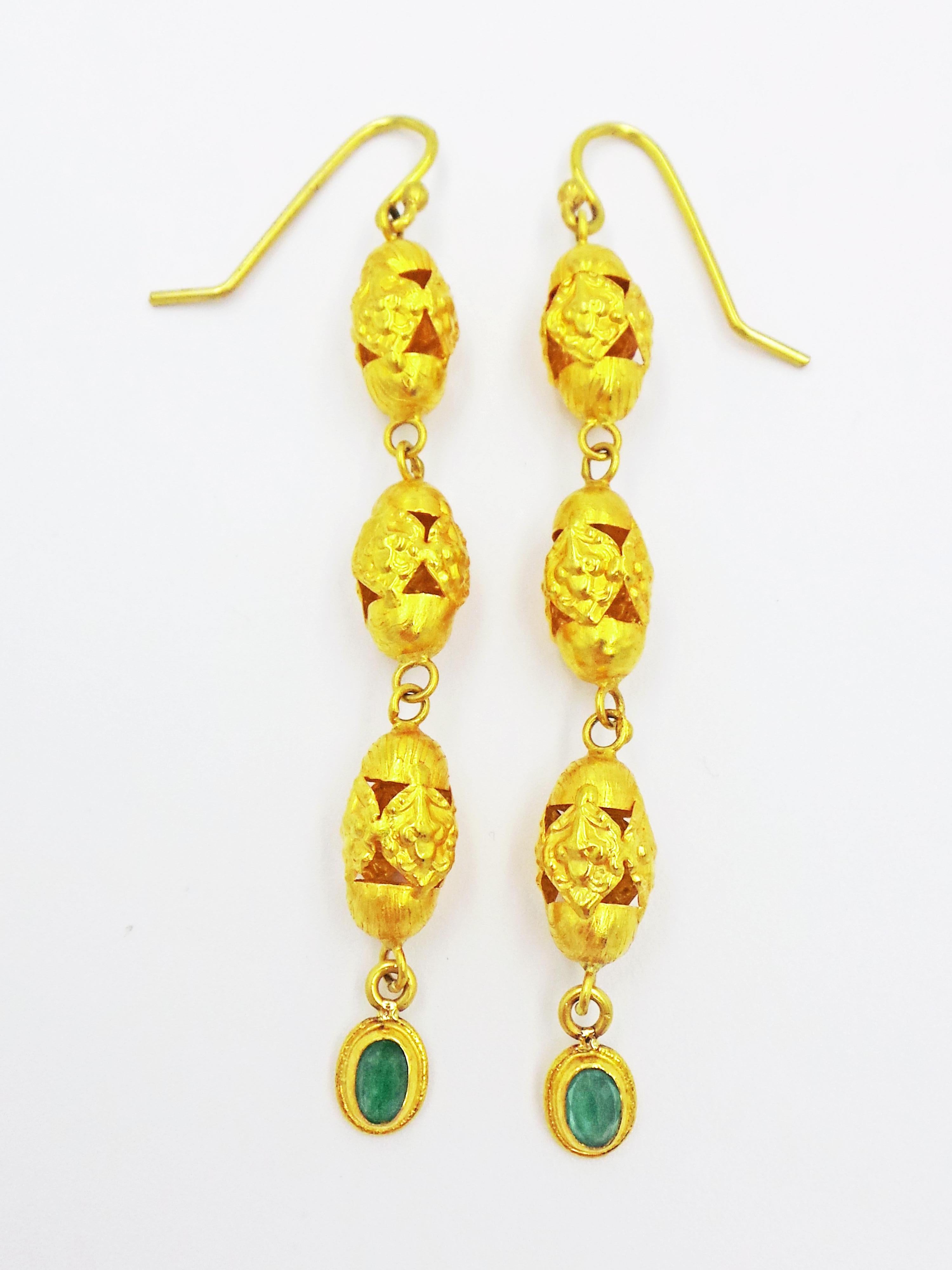 Stunning dangle earrings featuring rose-cut Emerald drops (1.10 total carat weight), 22k yellow gold French wires and vintage filigree beads. Their light weight make this pair of dangle earrings very wearable. Ring is 22k gold with a hammered,