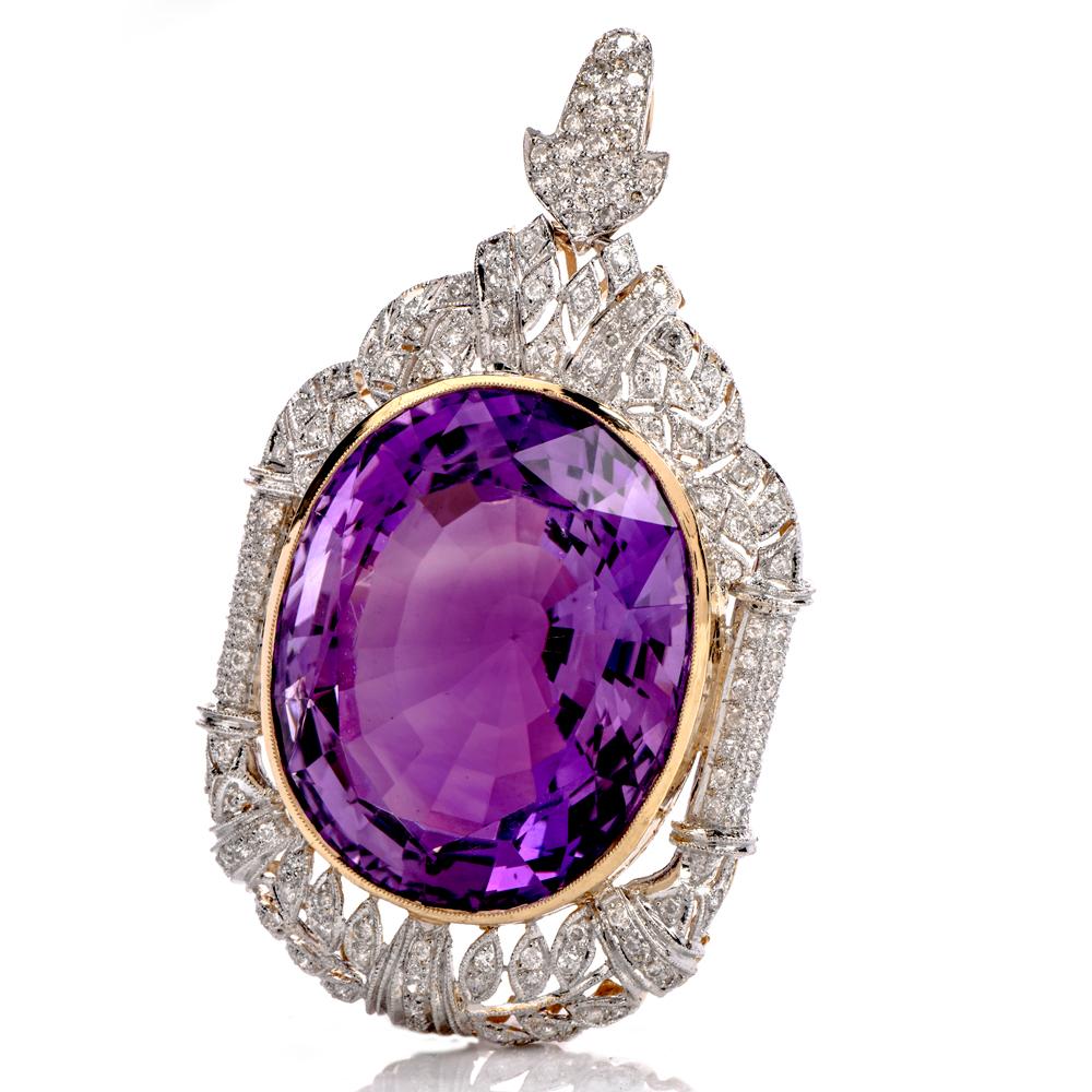 This alluring vintage large amethyst diamond pendant  is masterfully crafted in 18k god, weighing 22.0 grams and measuring 55 mm long and 32 mm wide.

This Beautiful Art Deco design Pendant centered with a large cushion oval genuine amethyst