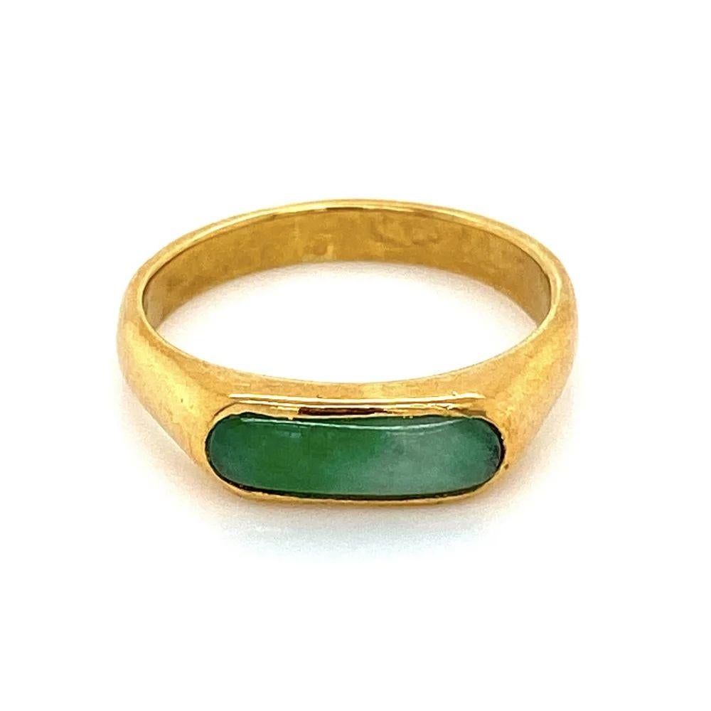 Simply Beautiful! Vintage Fine Green Jade Gold Band Ring. Securely Hand set with a Fine Green Jade. Hand crafted in 24 Karat Yellow Gold. Measuring approx. 0.76