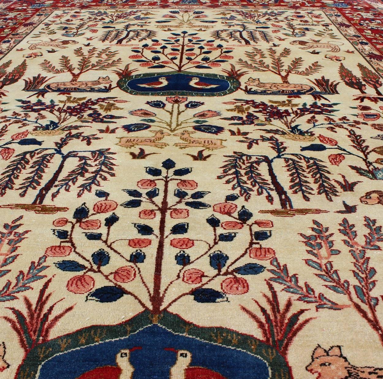 Vintage Fine Persian Isfahan Rug with Nature Motifs in Ivory, Blue, Brown & Red For Sale 1