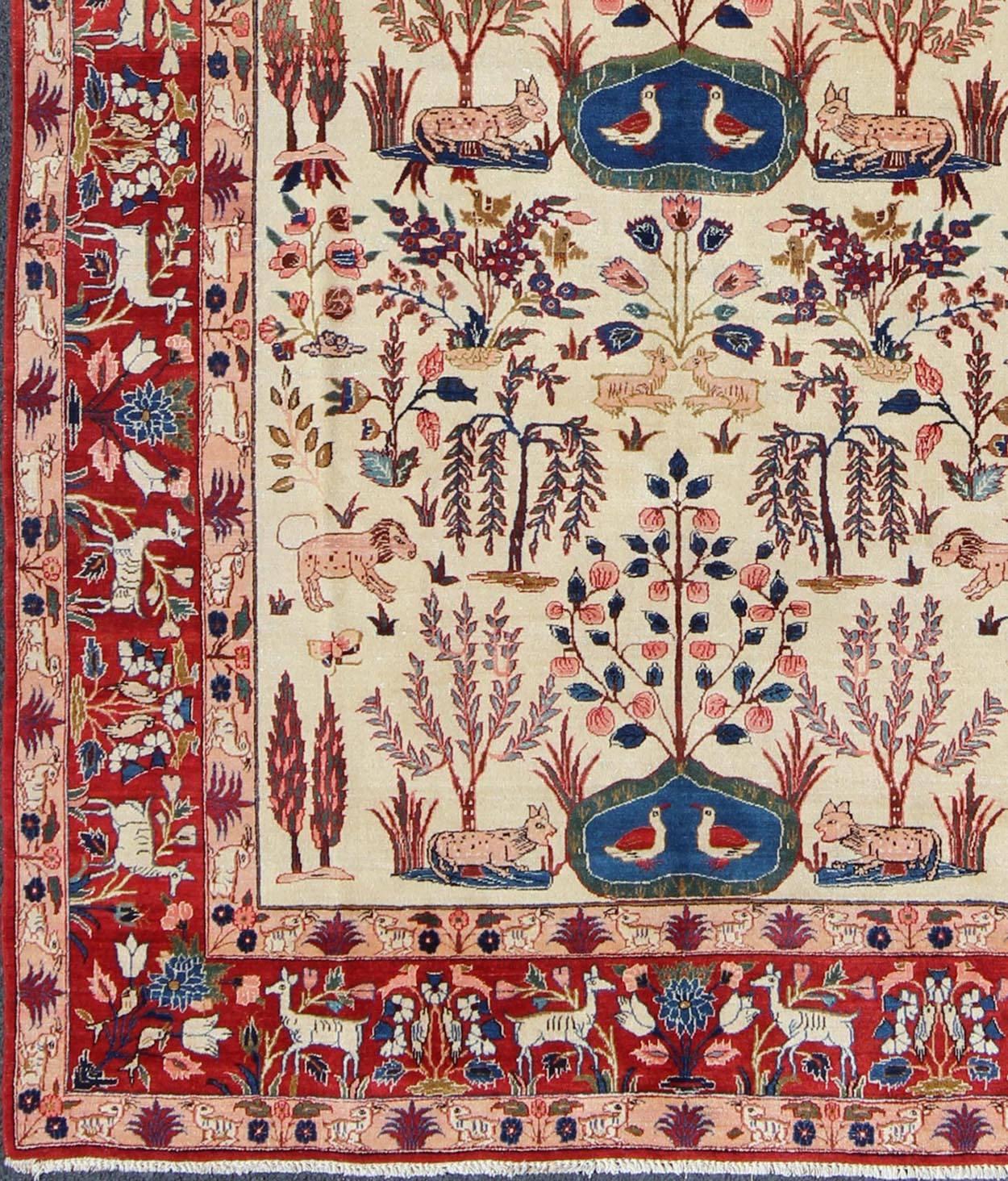 Semi antique Persian Isfahan rug with nature motifs in ivory  Blue, Brown and red, rug 10-70716, country of origin / type: Iran / Isfahan, circa 1930.

This outstanding Semi antique Persian Isfahan carpet is primarily characterized by its classical