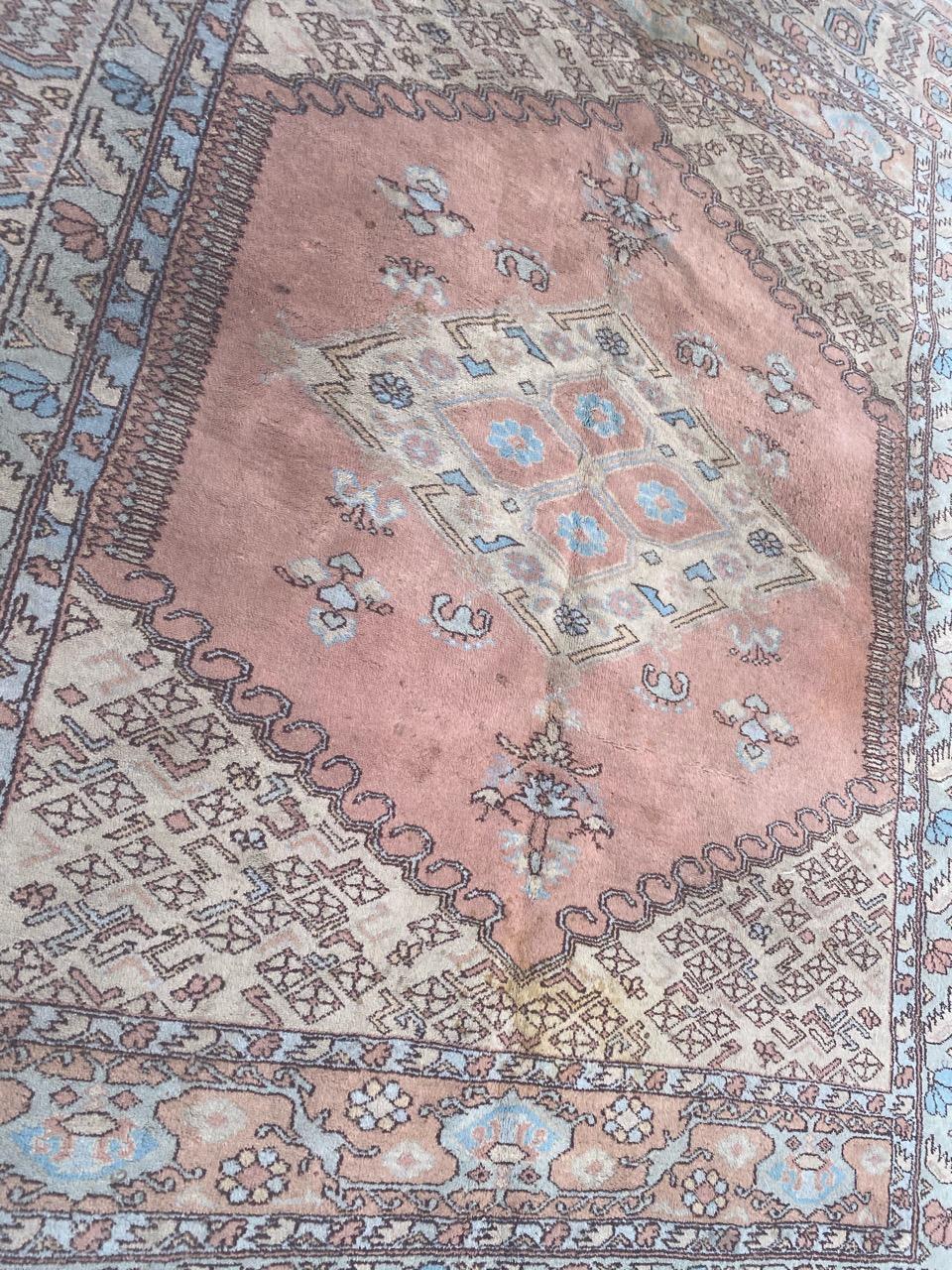 Nice Anatolian Turkish rug with beautiful geometrical design and pink field color, entirely and finely hand knotted with wool velvet on wool foundation