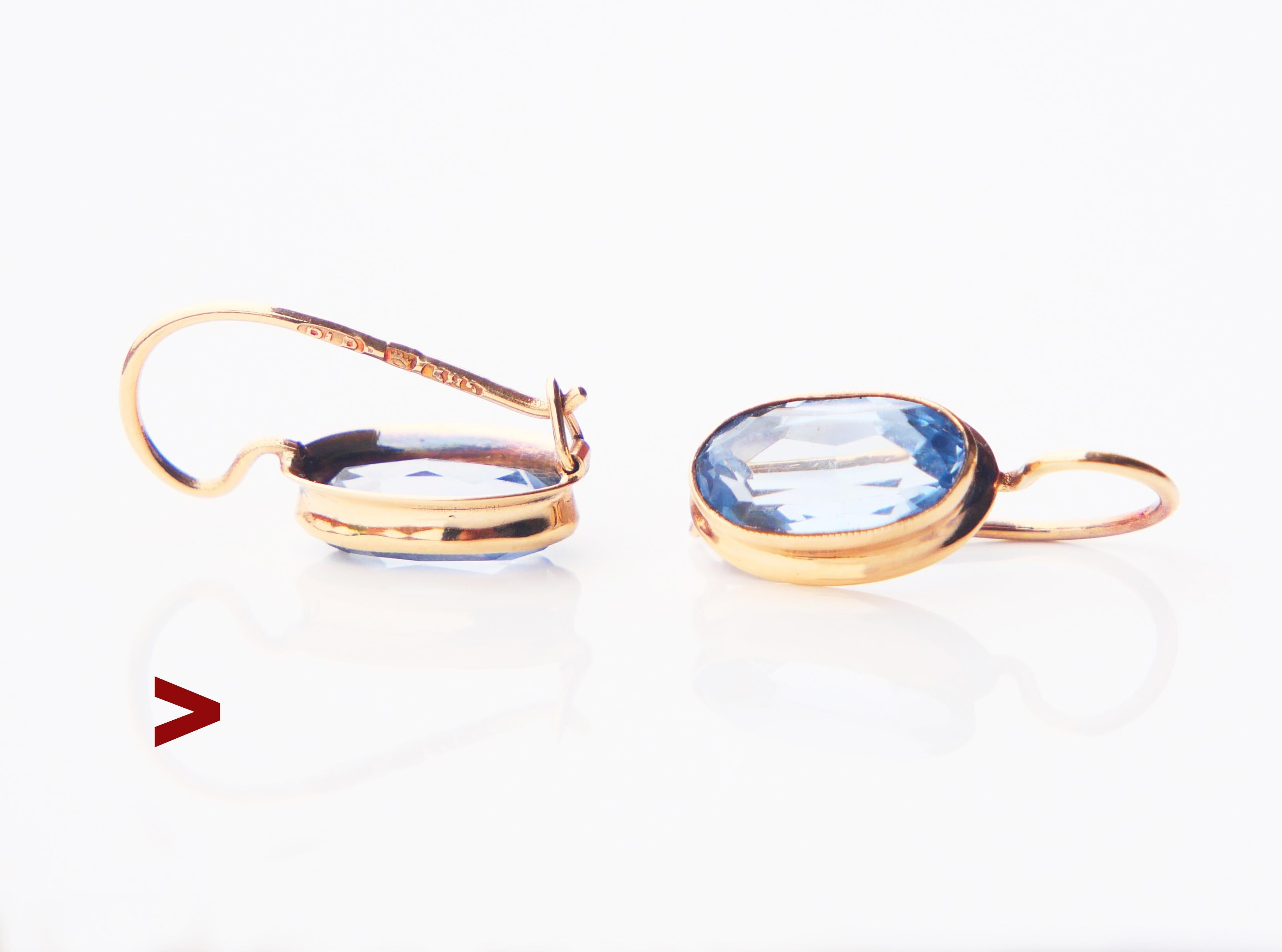 Ein Paar Finish Retro Vintage 14K Ohrringe auf sicheren Haken mit Lünette gefasst oval geschnittenen blauen Spinell Steine.
Die Steine werden im Labor hergestellt und sind Aquamarinen sehr ähnlich.

Hergestellt in Finnland, beide Drähte gestempelt
