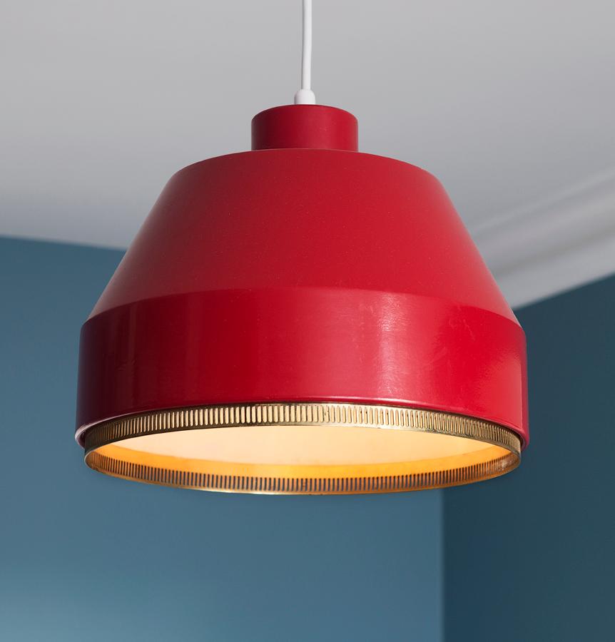 Aino Aalto
Finland, 1941

Red painted metal ceiling light with perforated brass ring.

About 
Finnish architect Aino Aalto (1894-1949) graduated from Helsinki Polytechnic in 1920. She joined Finnish architect Alvar Aalto’s studio in 1924 and