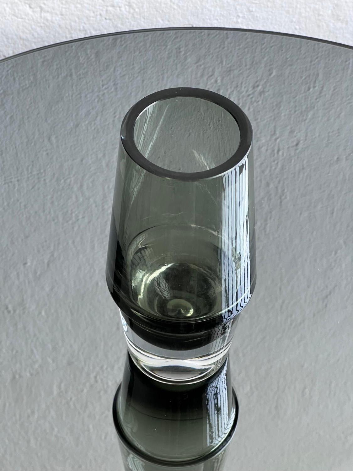 Murano Glass is a world-famous excellence. Not everyone, though, knows Finnish Glass – an equally refined, and possibly less common niche of blown and moulded vases and sculptures. The present vase is indeed an example of this latter school: