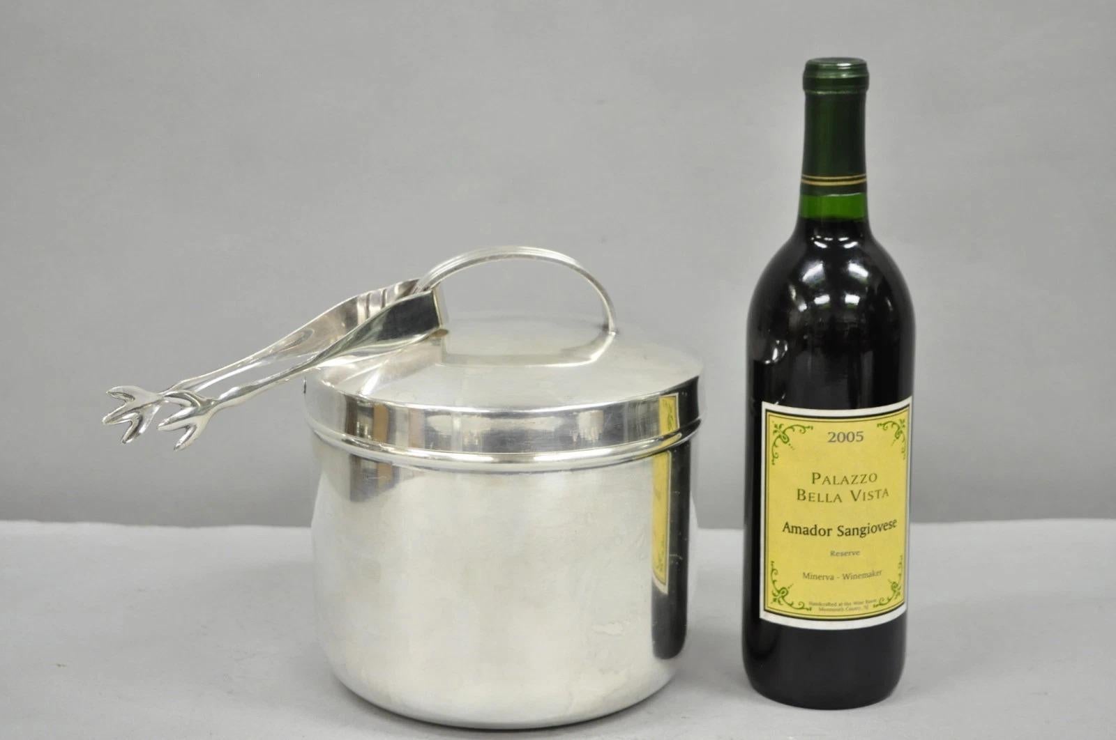 Vintage Mid Century Modern Art Deco Silver Plated Glass Lined Lidded Lidded Ice Bucket with Locking Lid and Tongs by Fisher. Circa Mid 20th Century. Dimensions : 8