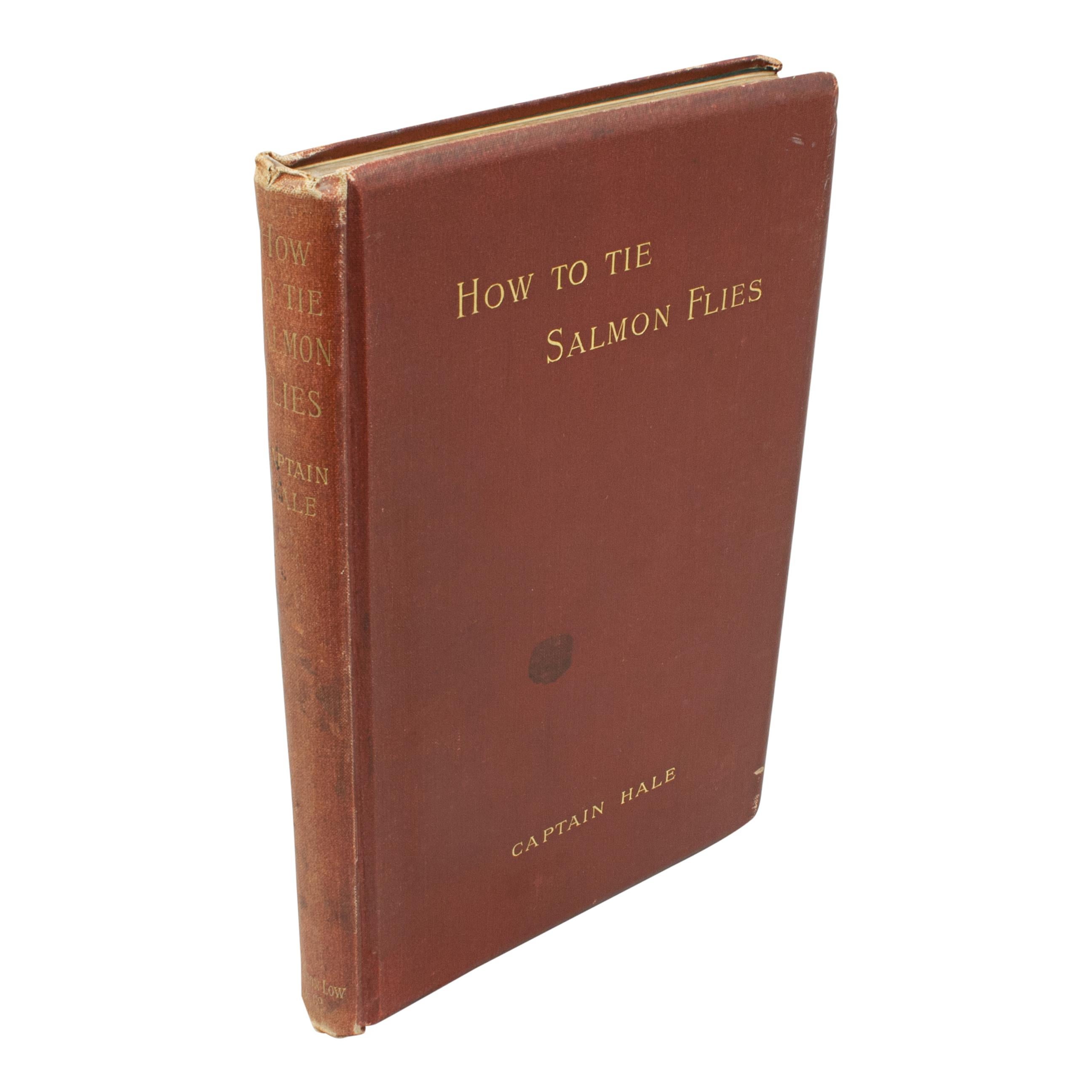 A good 1st edition angling book by Captain Hale of the East Lancashire Regiment entitled 'How to Tie Salmon Flies'. This is a hard back copy with original red cloth binding with gilt lettering to the front board and spine. Title page printed in red