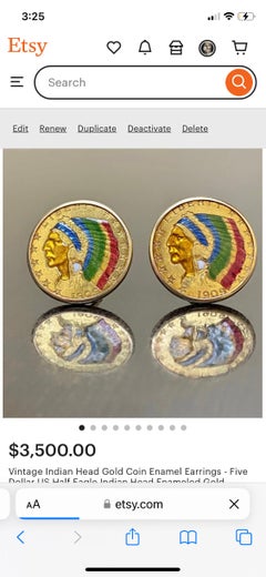 Boucles d'oreilles vintage de cinq dollars américains en or émaillé avec demi tête d'aigle indien