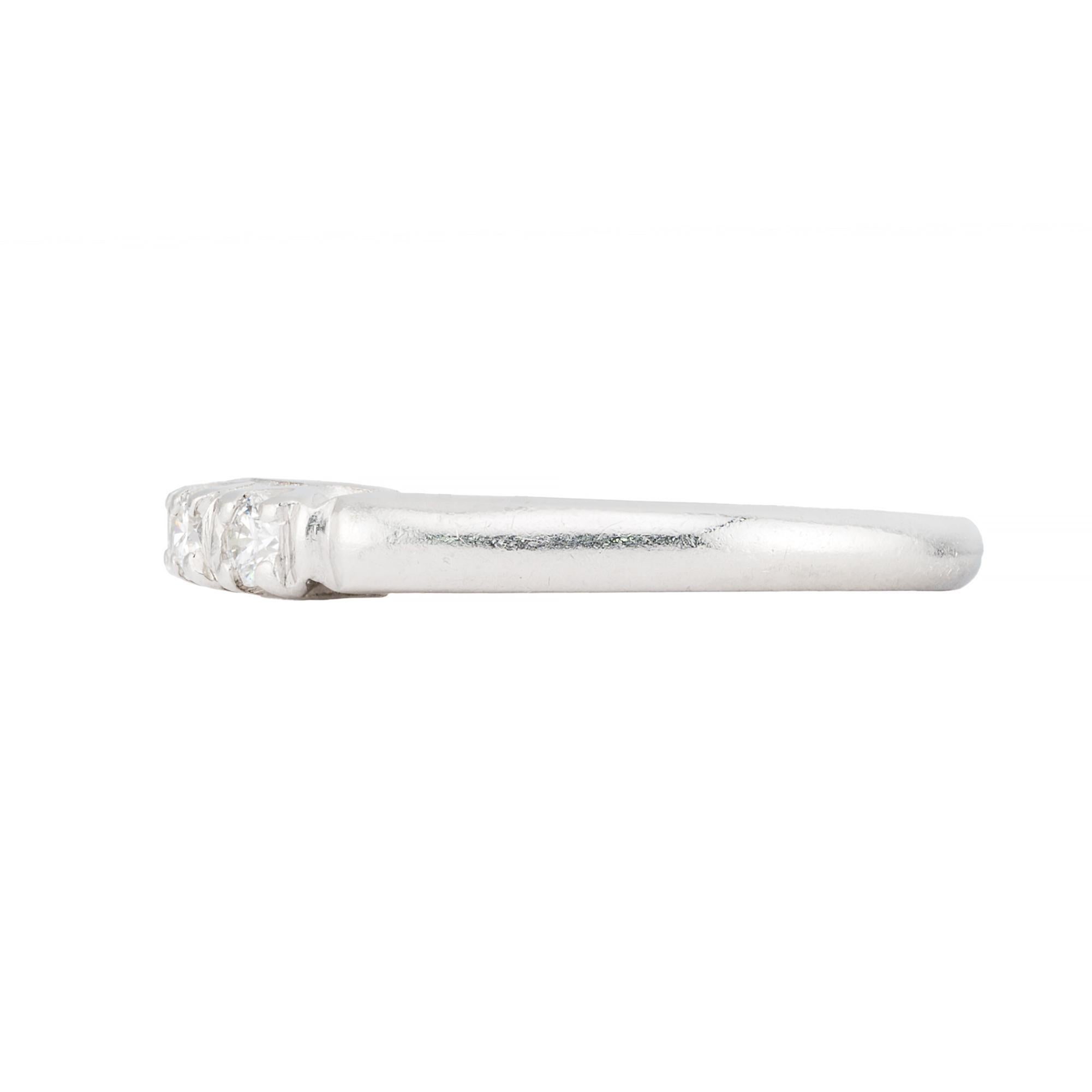Aston Estate Jewelry Presents:

A refined vintage wedding ring featuring a series of brilliant-cut diamonds totaling 0.25 carats, G color, VS1 clarity.

This exquisite piece is crafted in platinum, embodying a sophisticated design.

Ring width