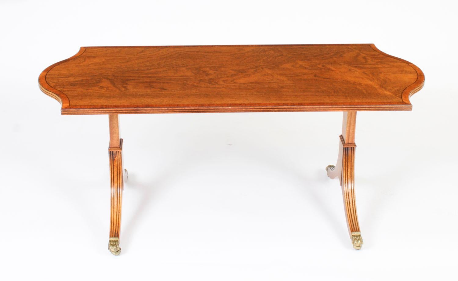 William Tillman shaped rectangular coffee table having crossbanded top, on splay supports with brass caps and casters, 50cms high x 114cms x 50cms

This is a fabulous Vintage coffee table by the master cabinet maker William Tillman,  Circa 1980 in