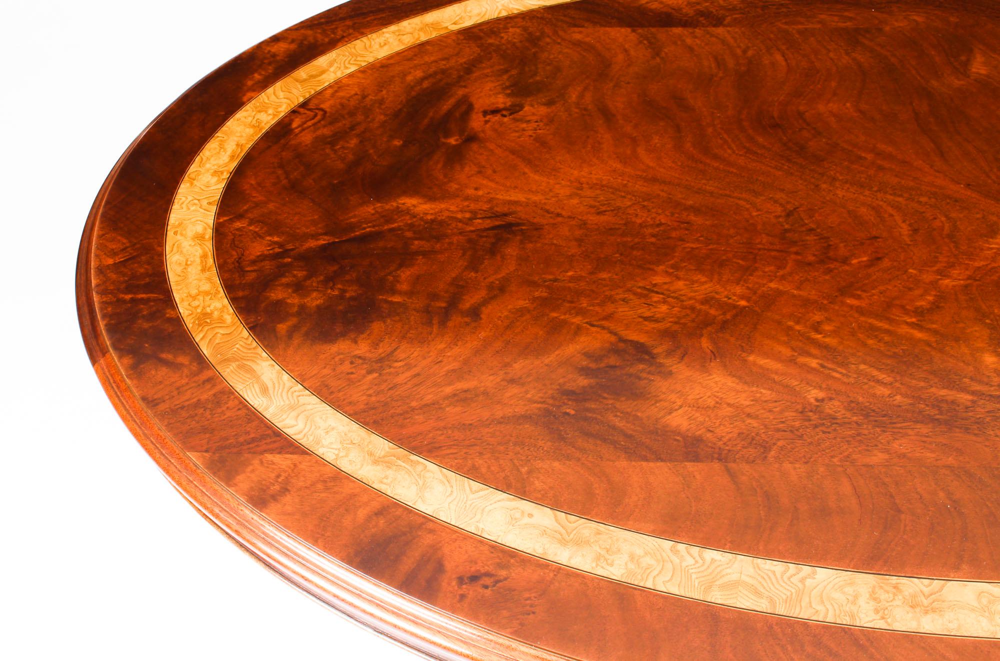 English Vintage Flame Mahogany Oval Coffee Table by Charles Barr, 20th Century